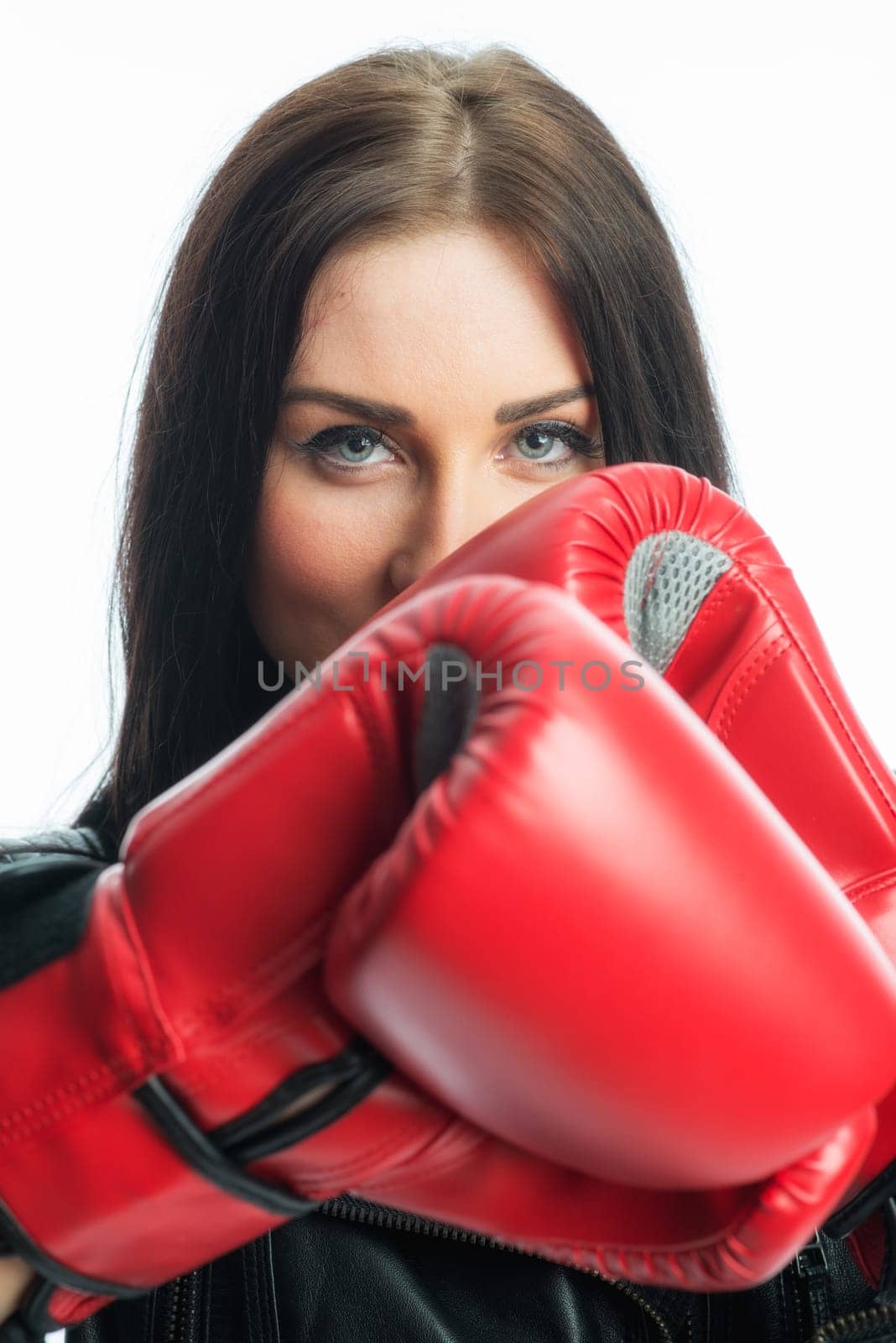 Young girl with boxing gloves
