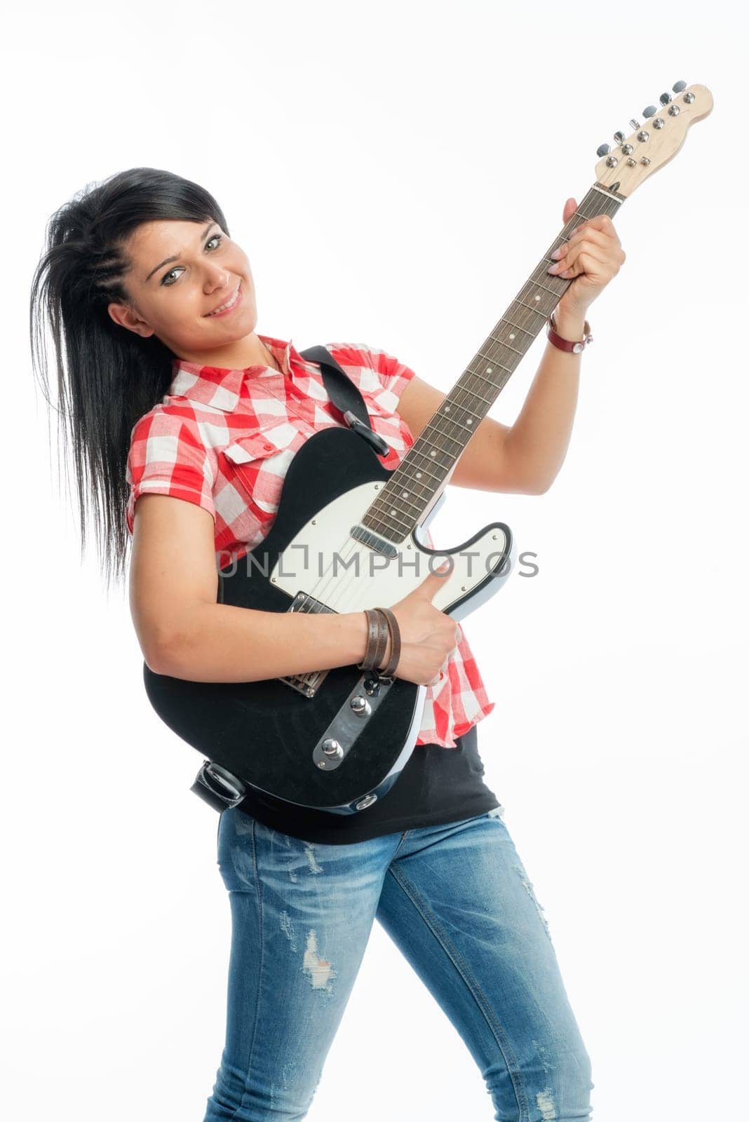 Wild girl with electric guitar