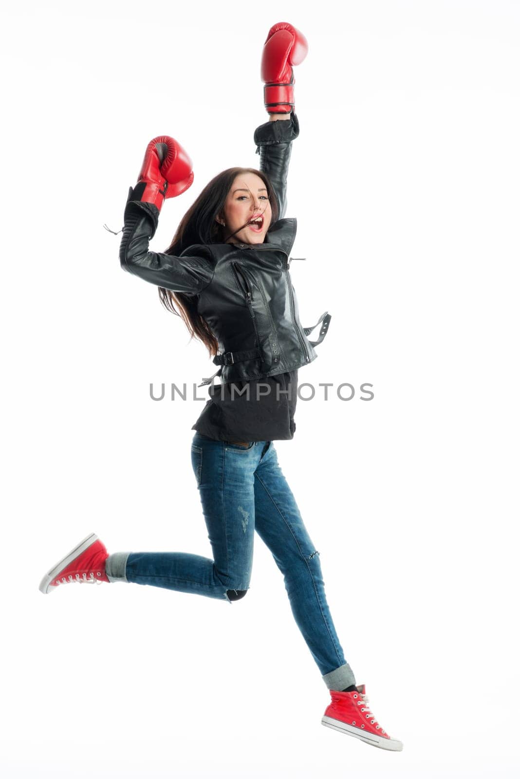 Young woman with boxing gloves