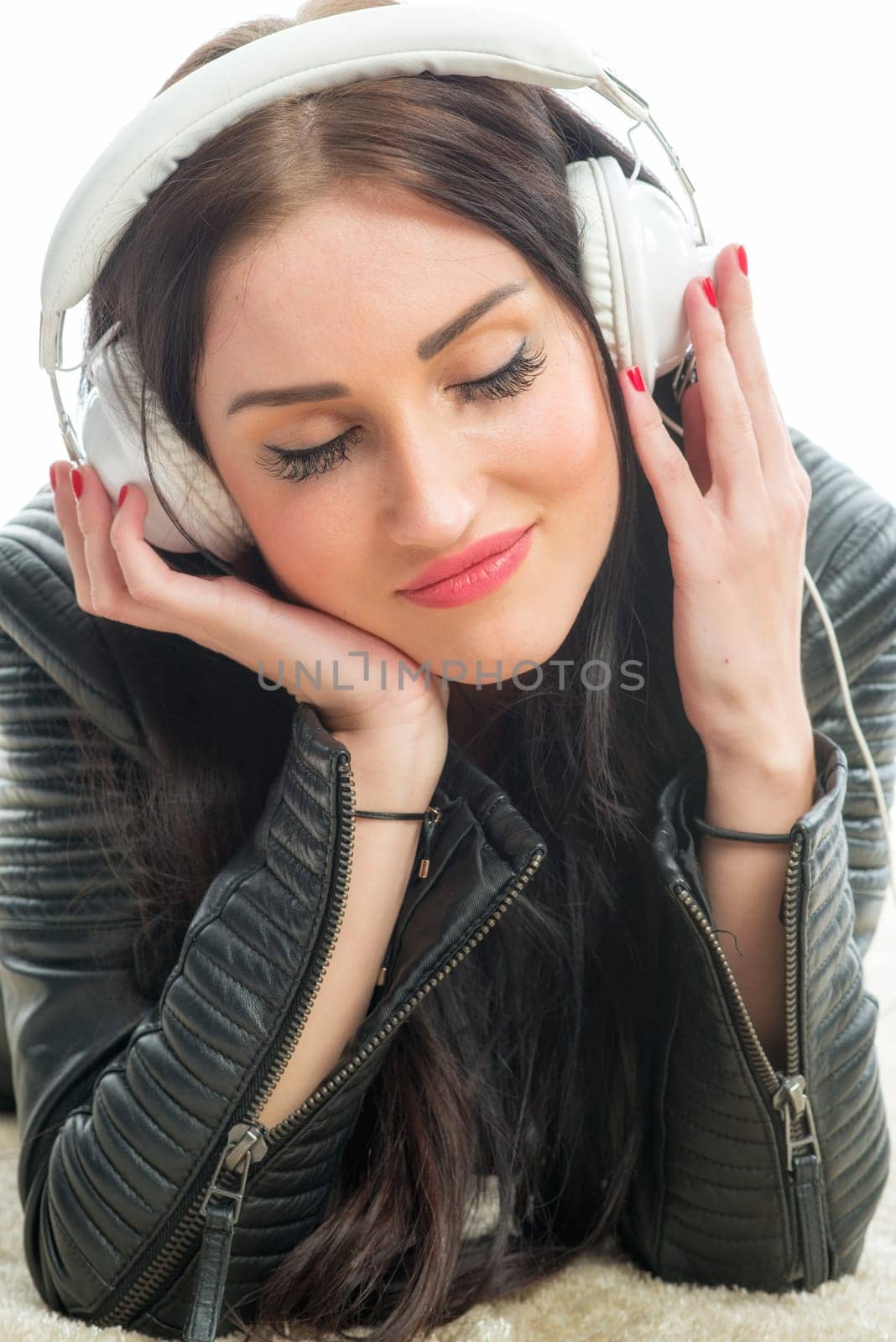 Racewoman with headset enjoys music