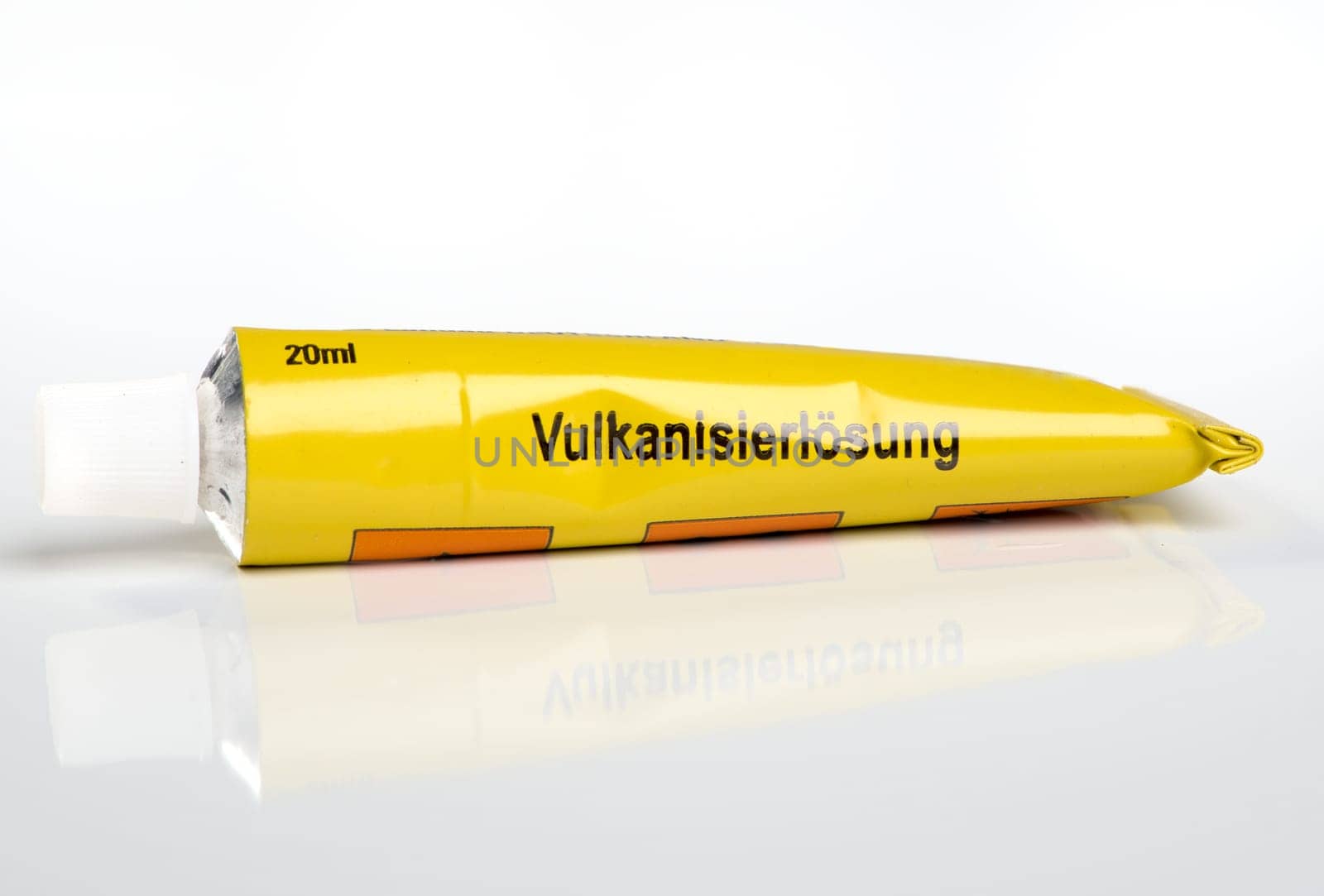 A yellow tube of glue
