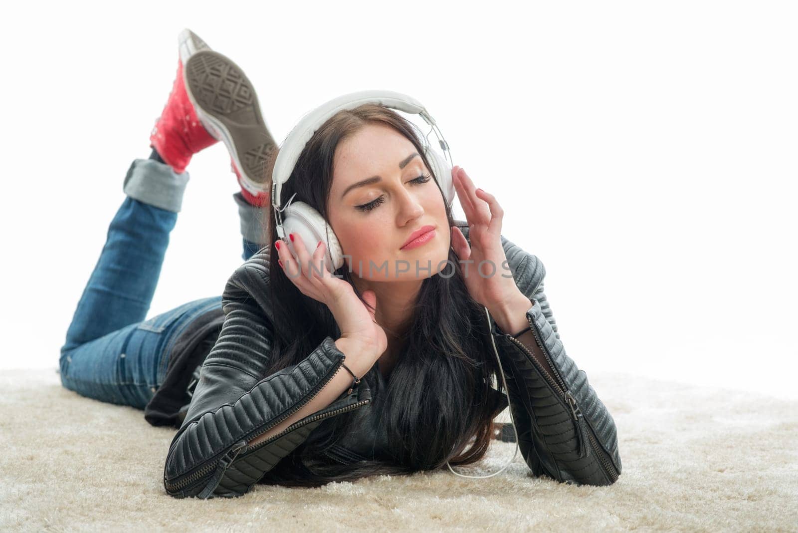 Racewoman with headset enjoys music