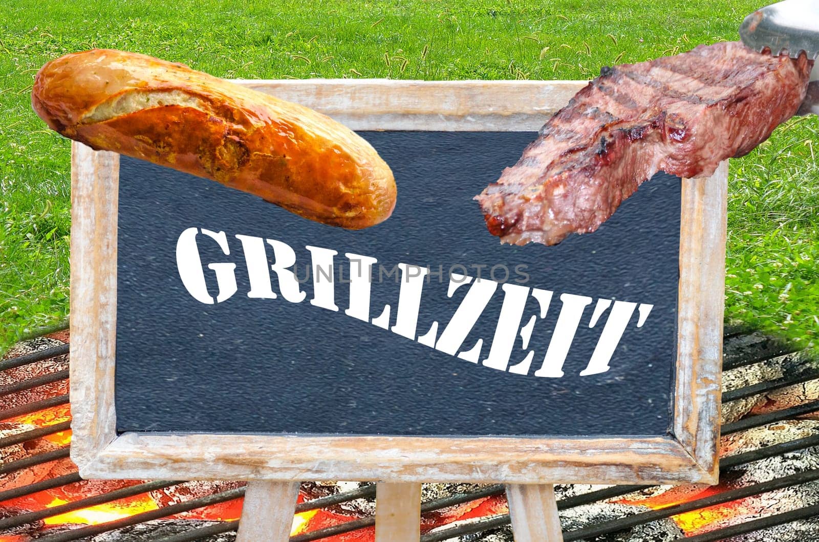 Table with inscription Grillzeit with grilled sausage and steak over charcoal fire