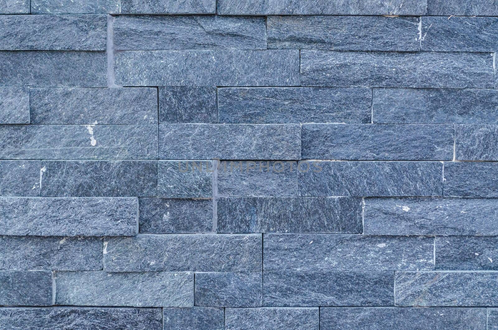House wall renovated with thermal insulation and clad with a beautiful clinker stone.