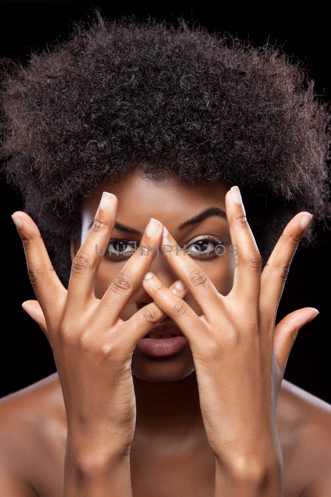 Young African beauty covering face with hands