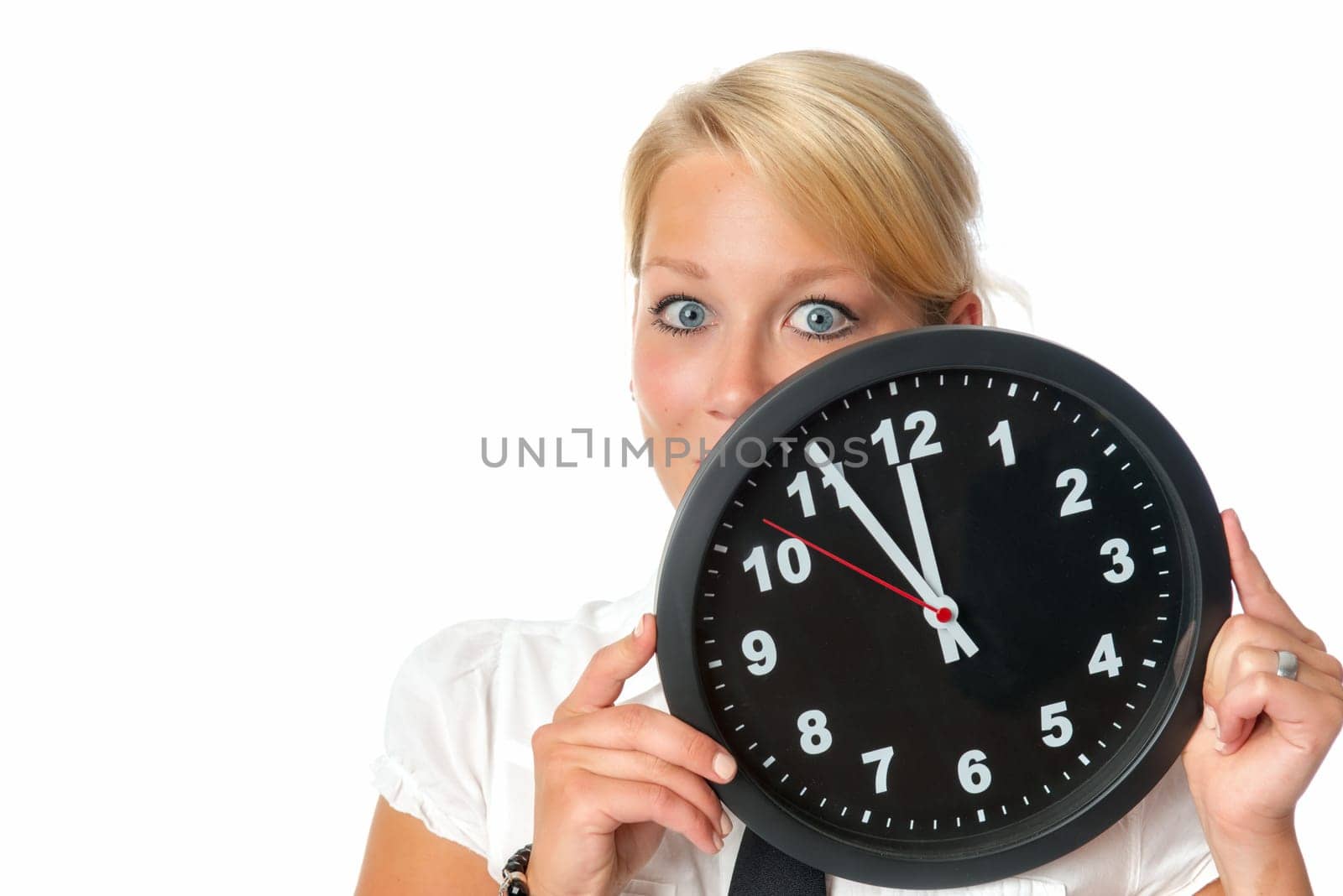 Woman holds a wall clock