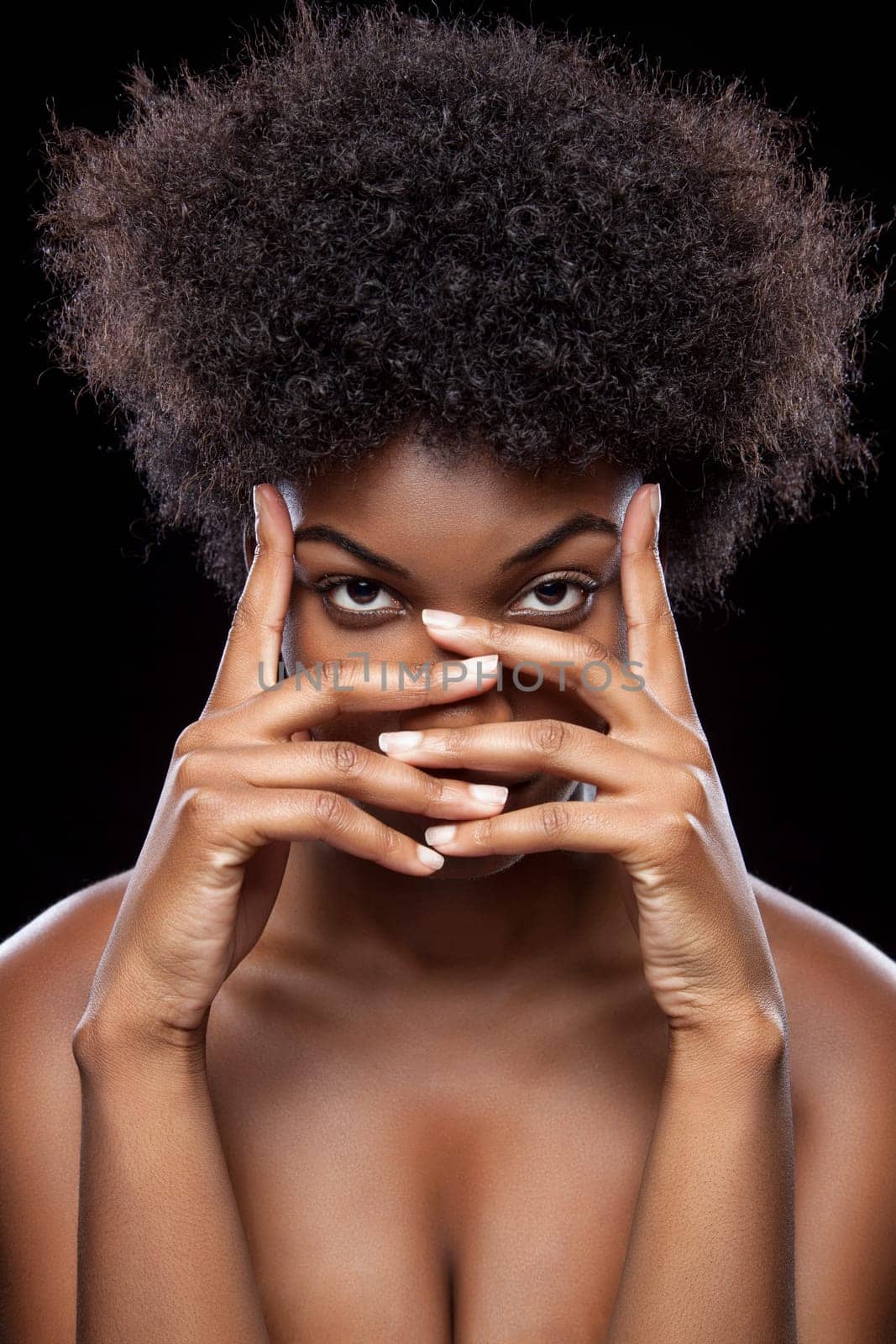 Young African beauty covering face with hands