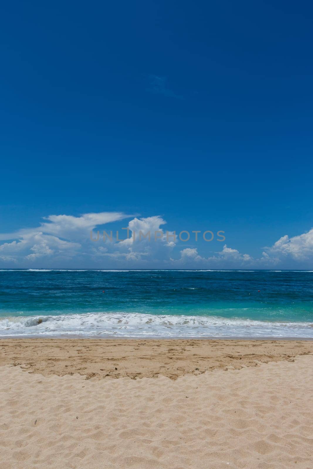 Beautiful secluded sandy beach in the Caribbean with white sand and blue sky as in paradise