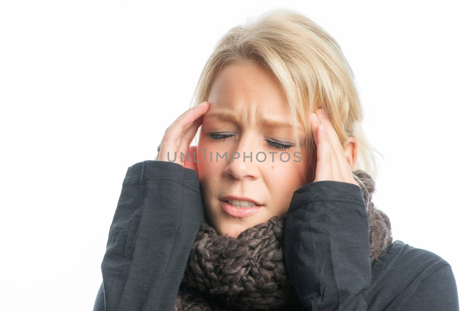 Blonde woman with headache