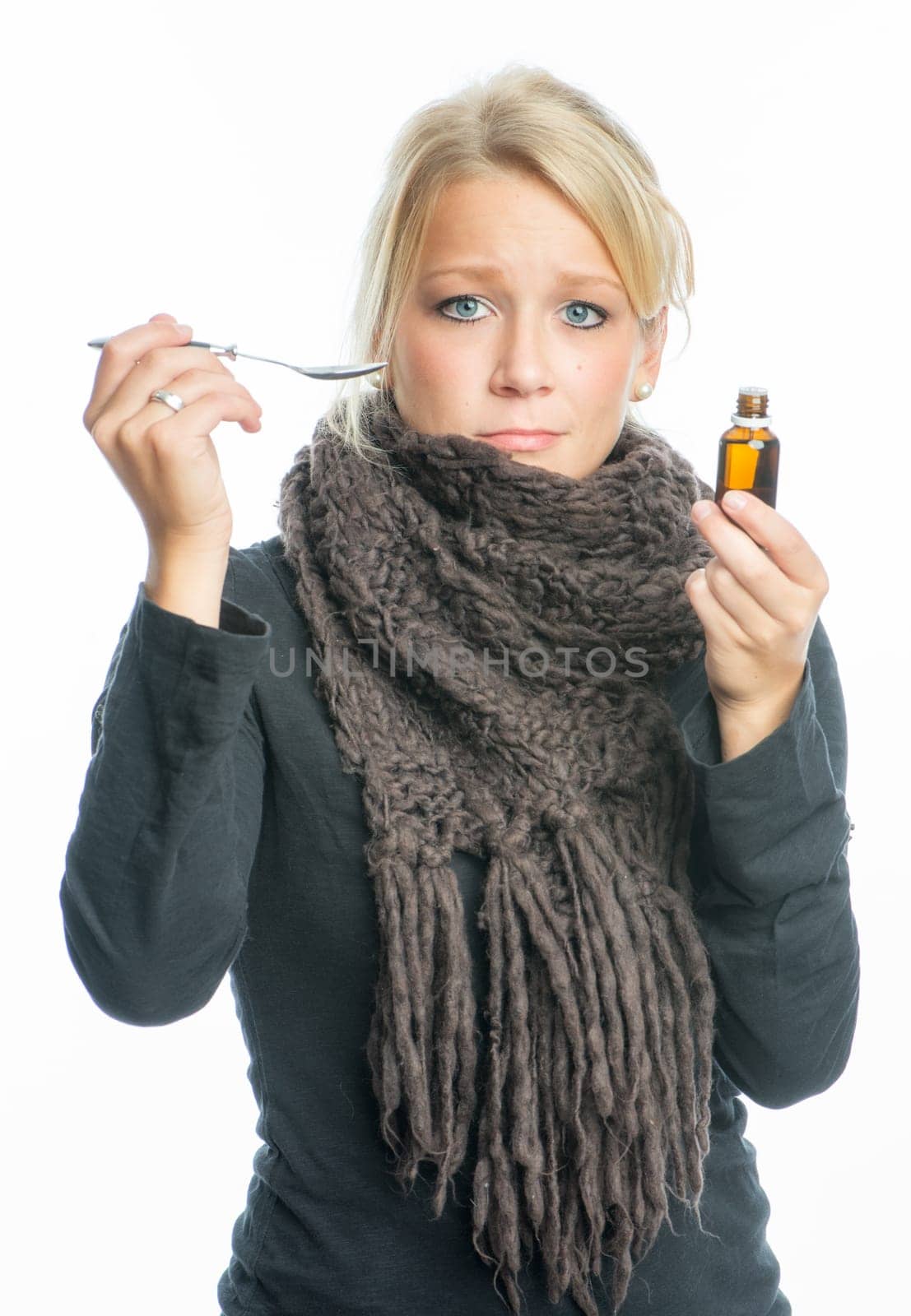 Sick woman with cough drops