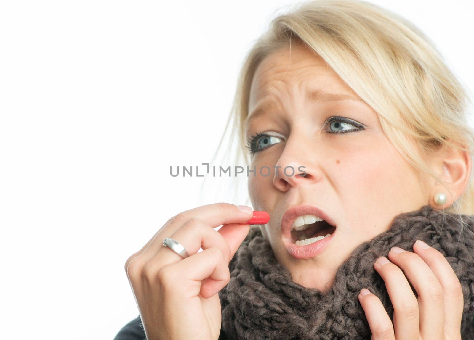 Sick blonde woman with medication