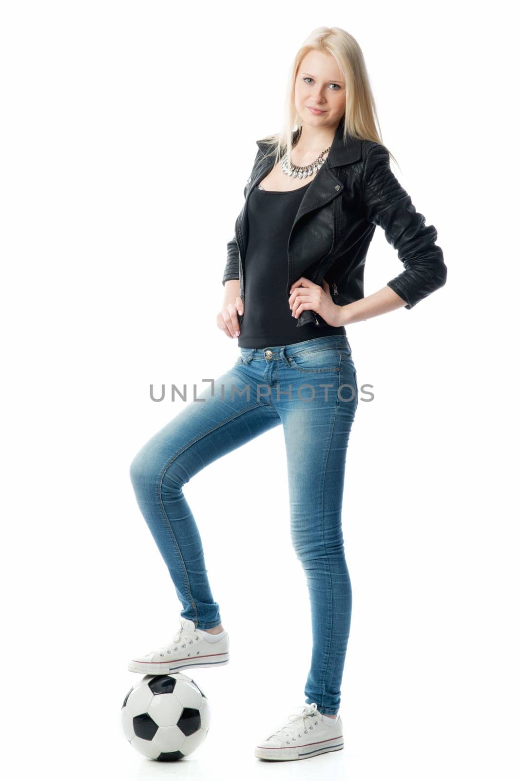 Blonde girl with football