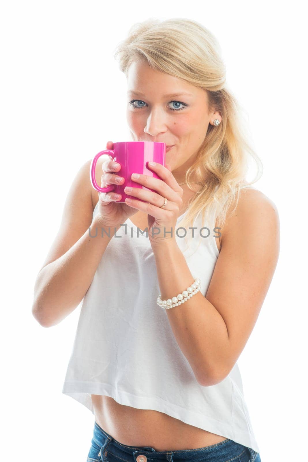 Young woman drinks coffee