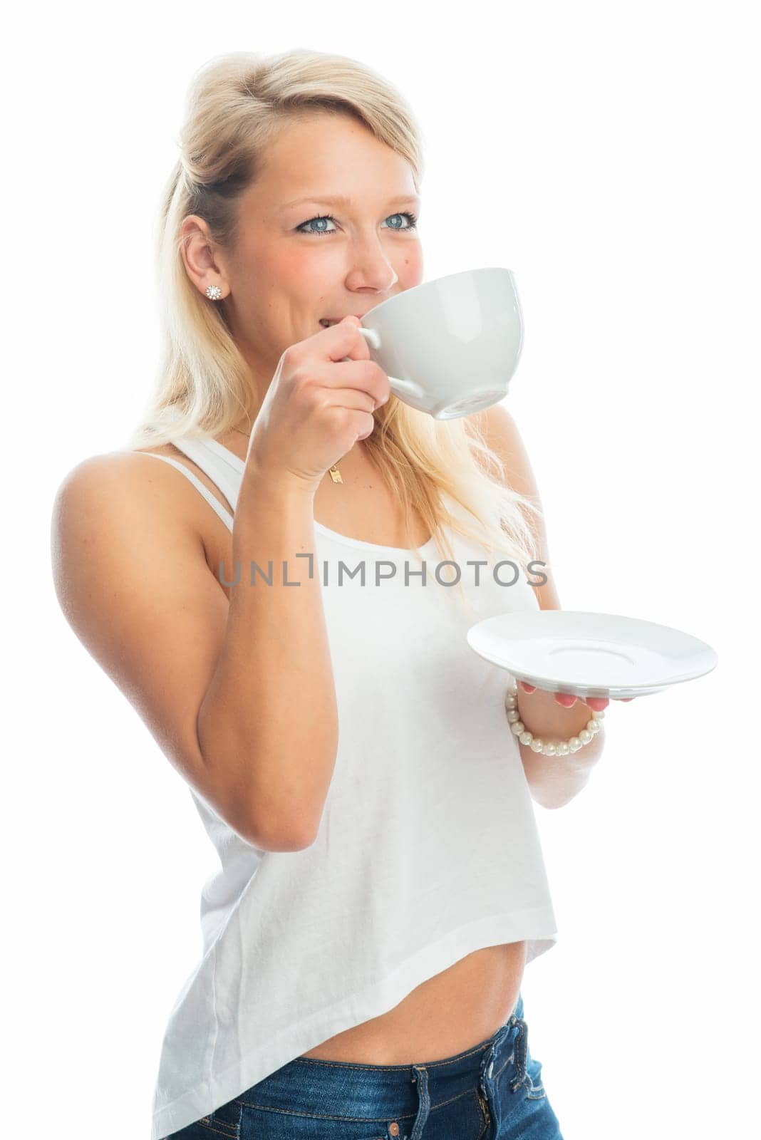 Young woman drinks coffee