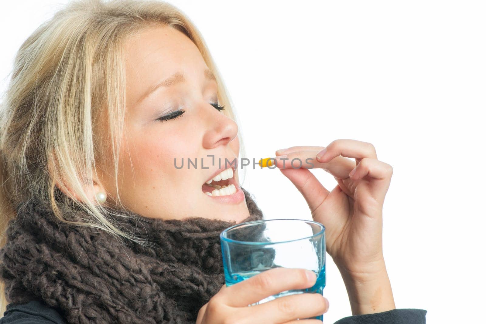 Sick blonde woman with medication