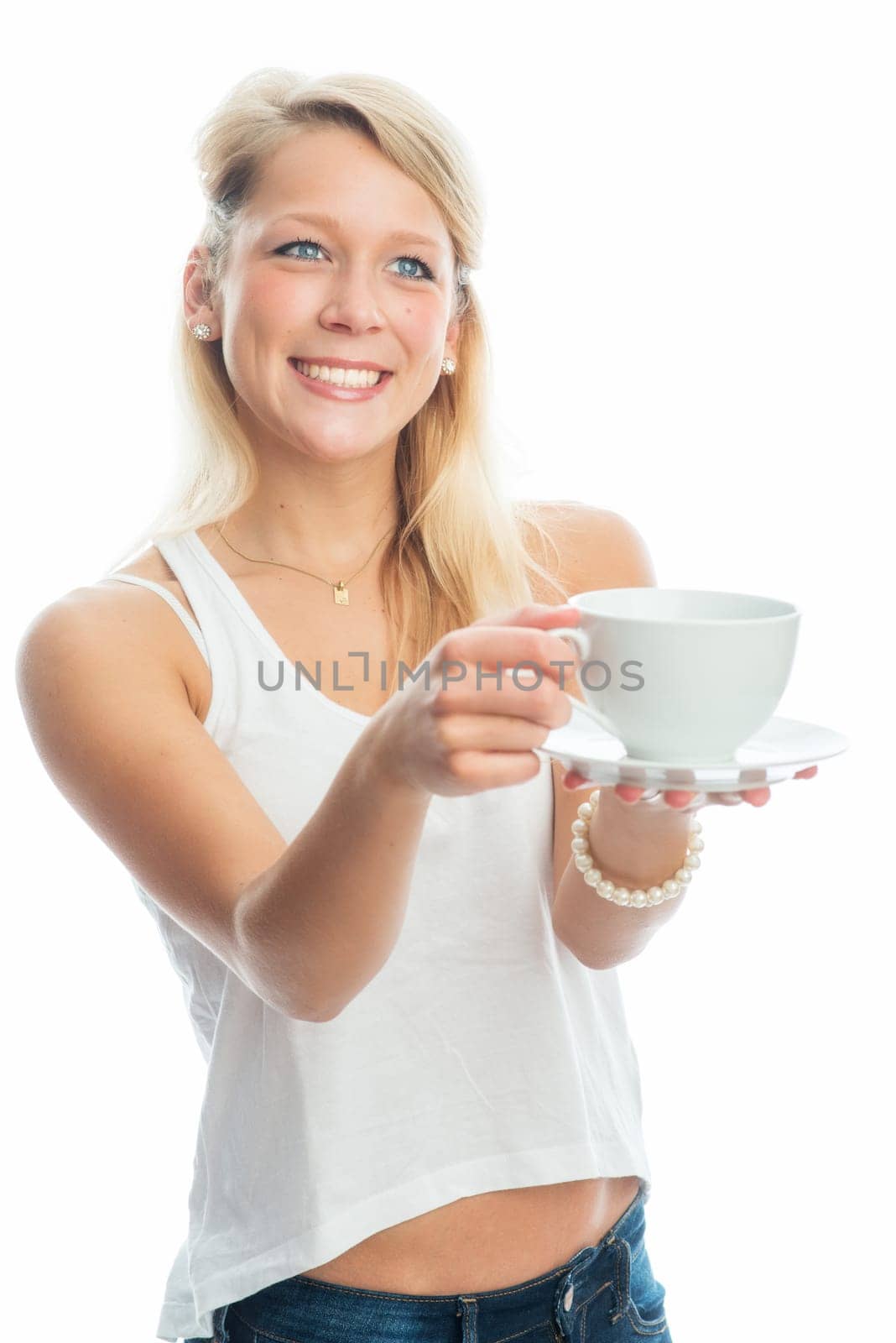 Young woman drinks coffee