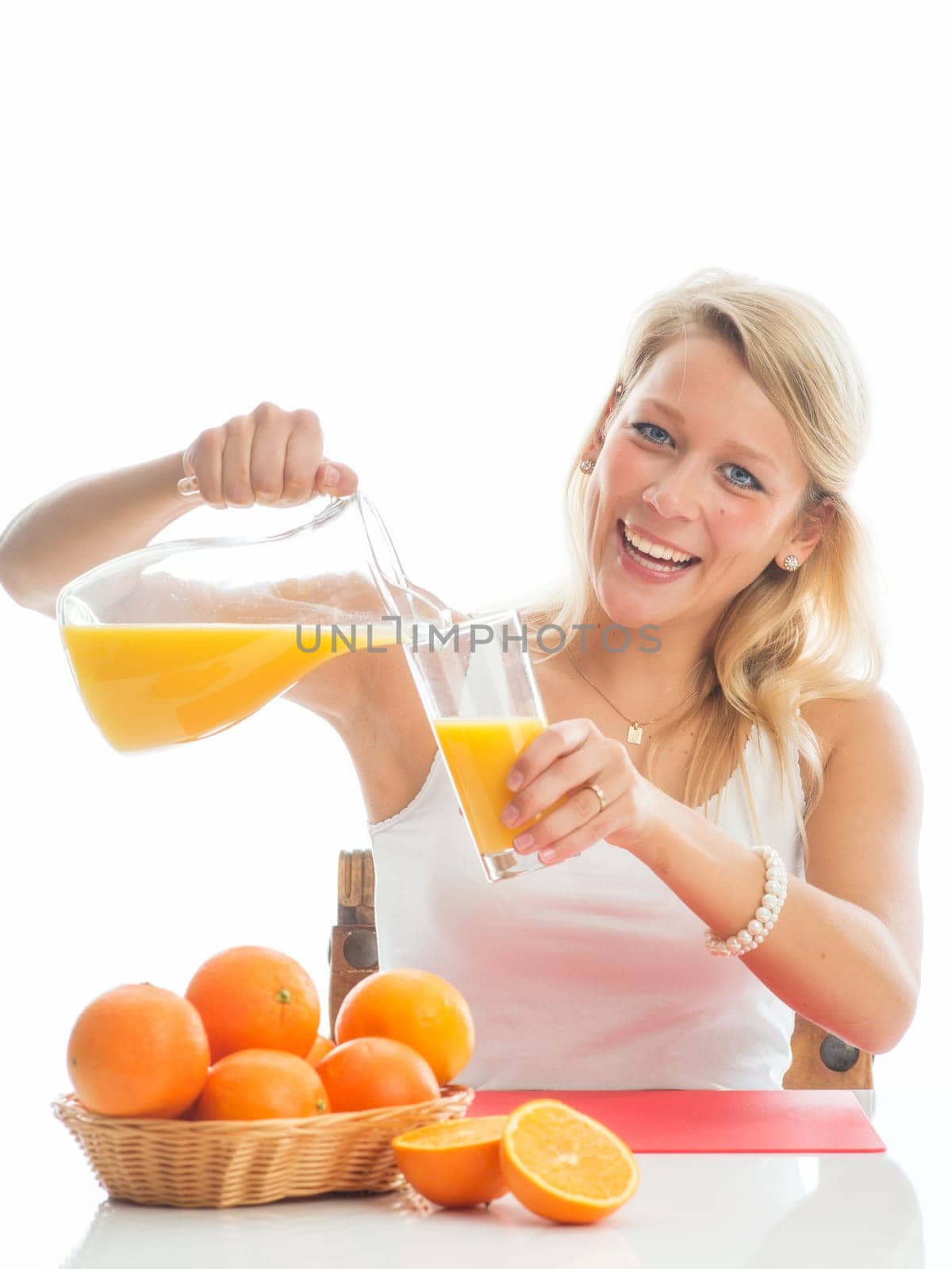 Blonde woman with orange juice