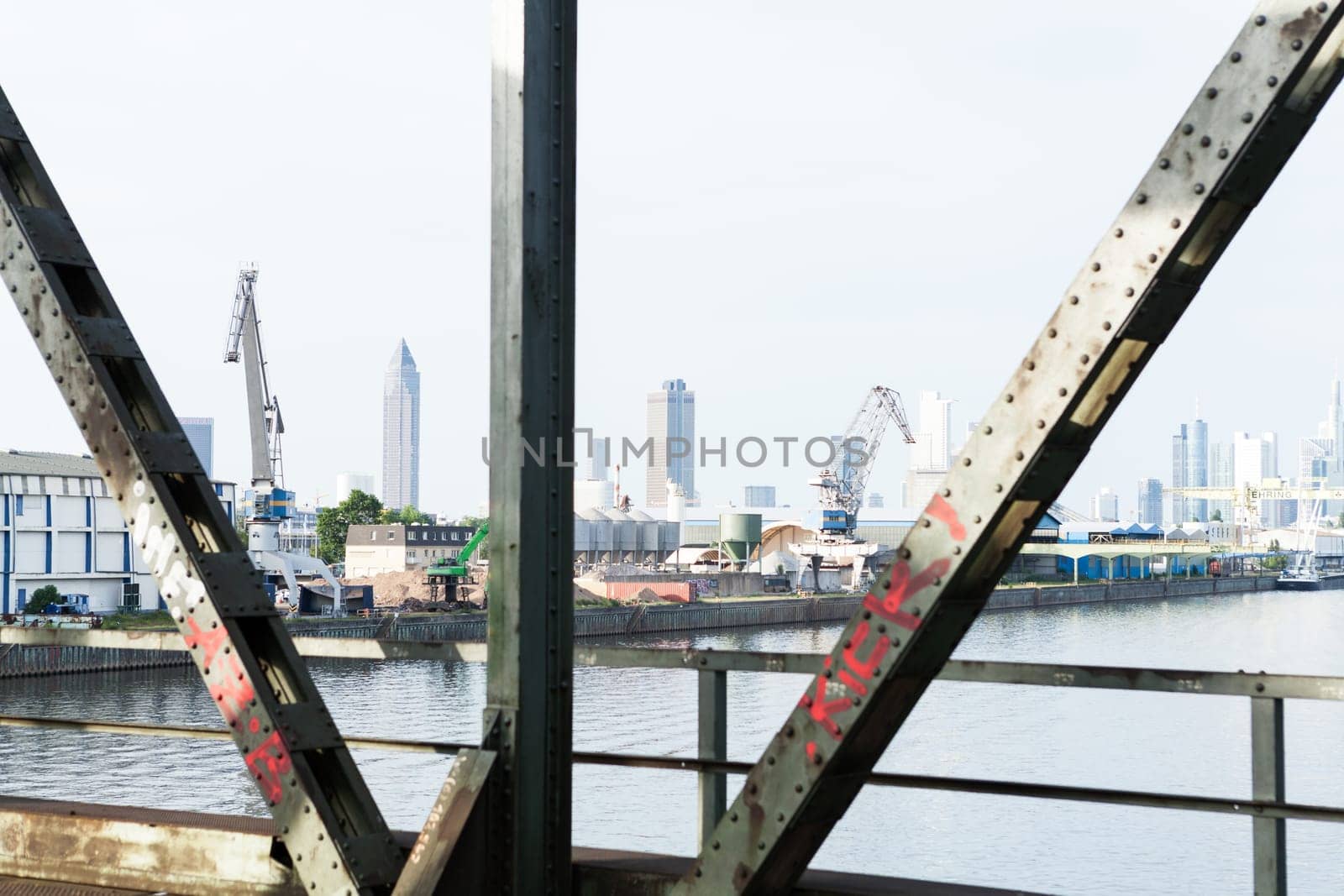 Abandoned bridge with rails for train traffic in daylight