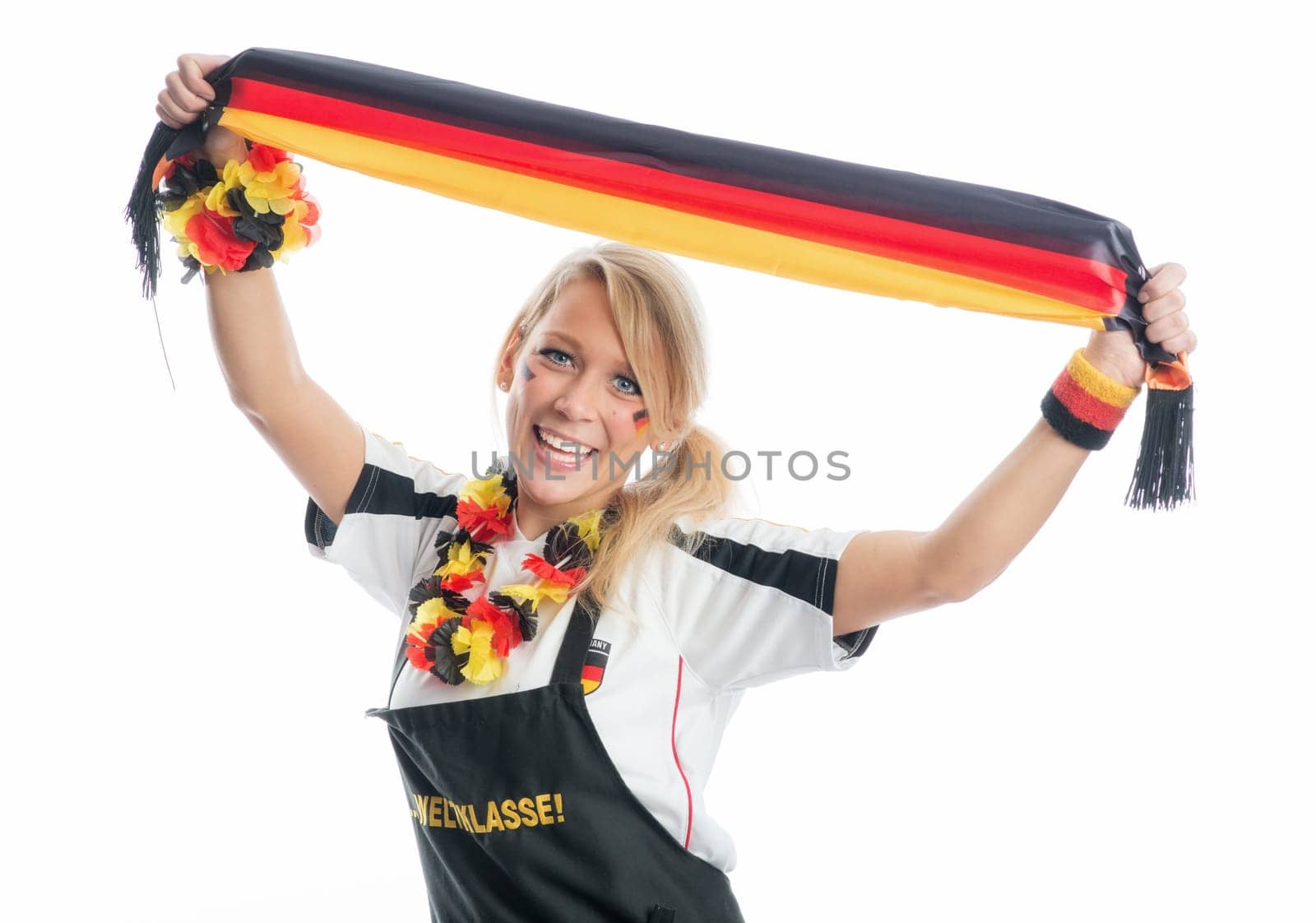 Blonde football fan with fan scarf
