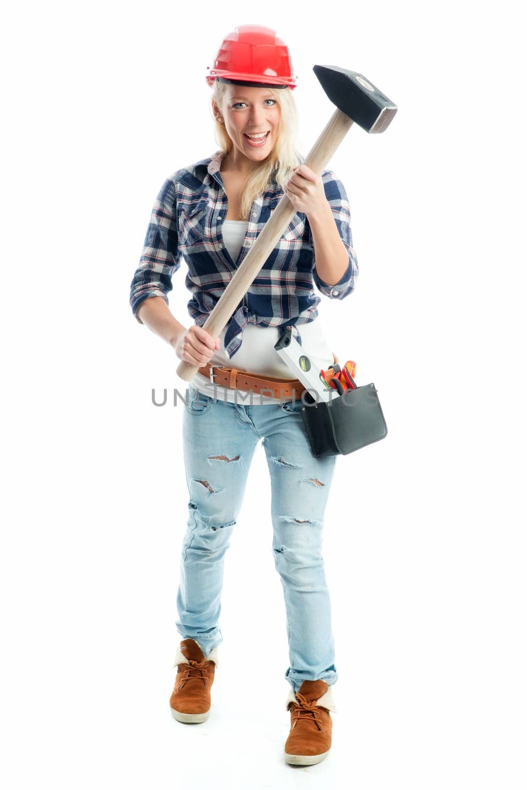 Female craftsman with sledgehammer