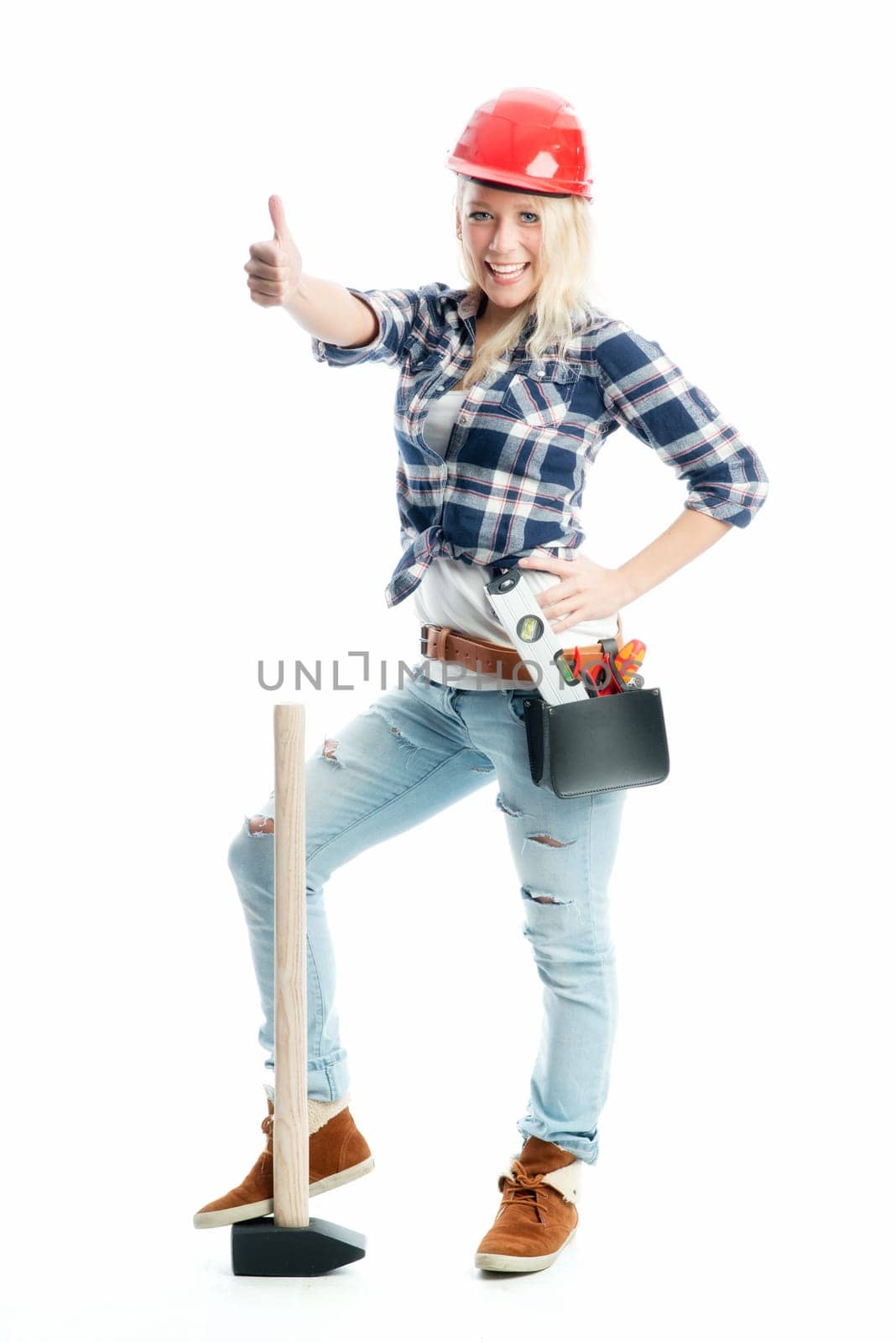 Female craftsman with sledgehammer