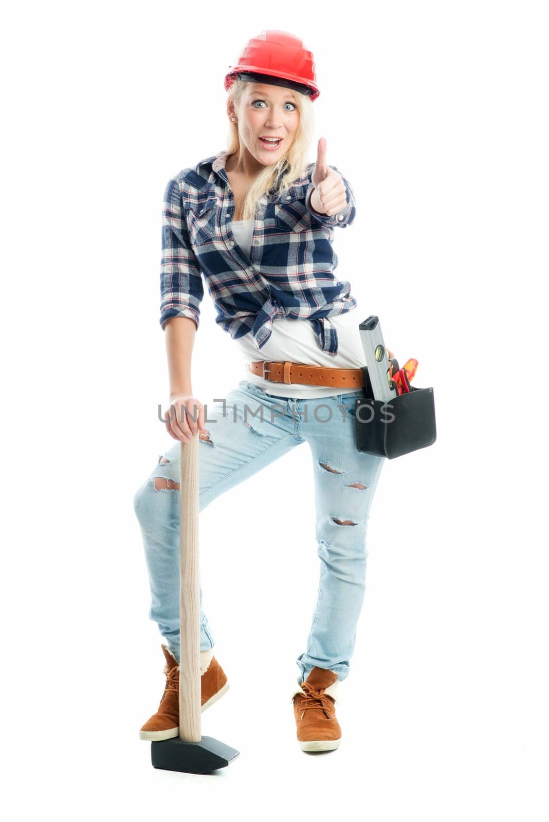 Female craftsman with sledgehammer