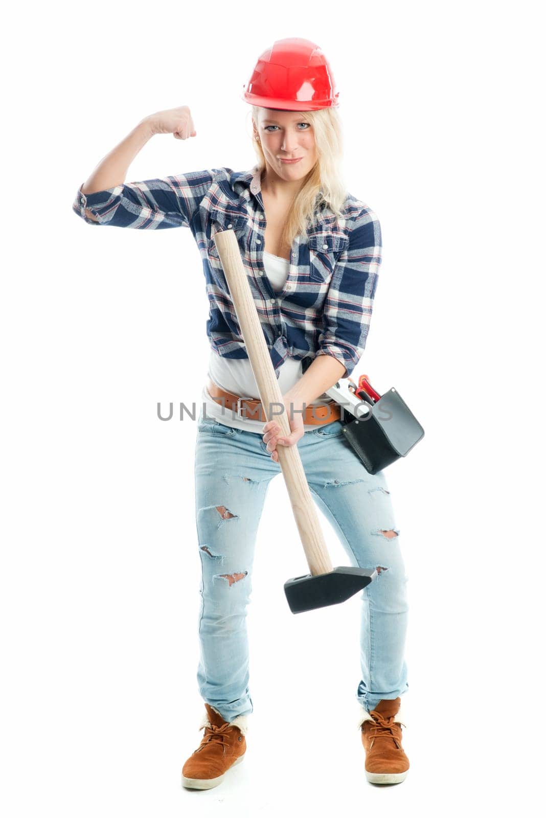 Female craftsman with sledgehammer
