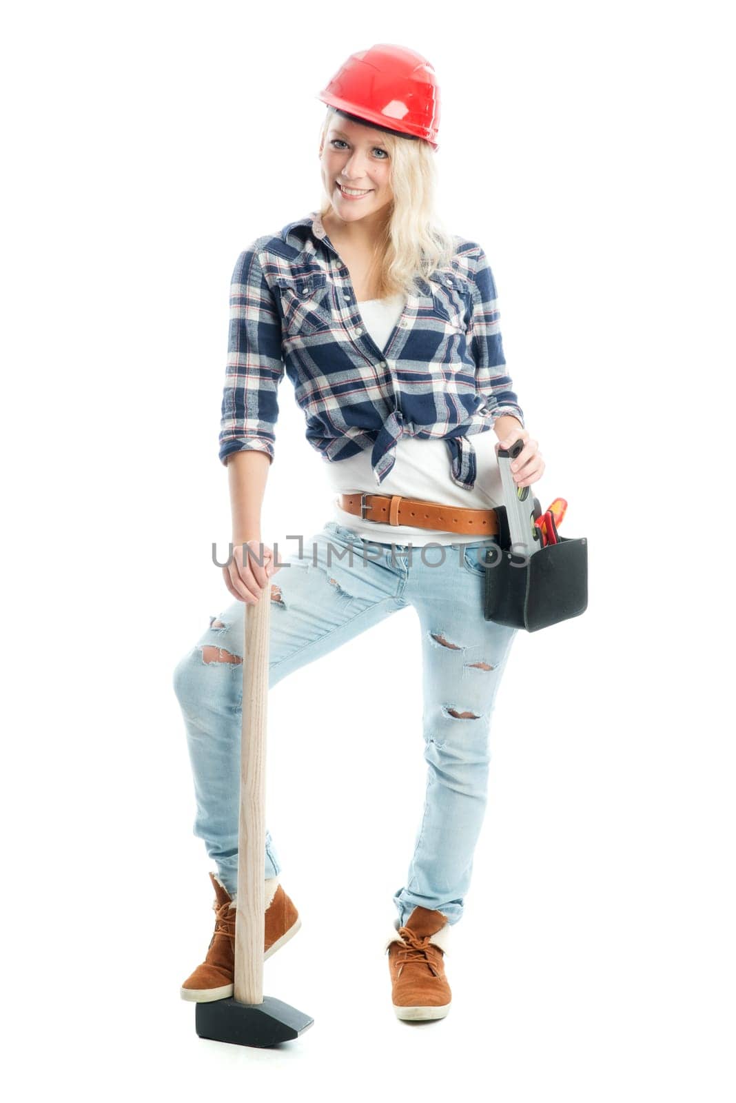 Female craftsman with sledgehammer