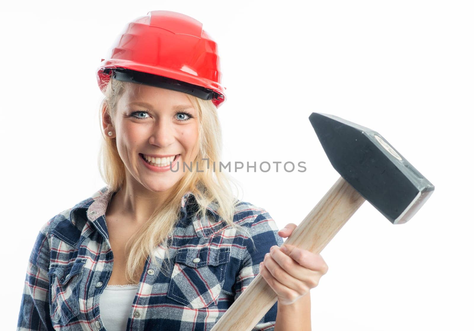 Female craftsman with sledgehammer