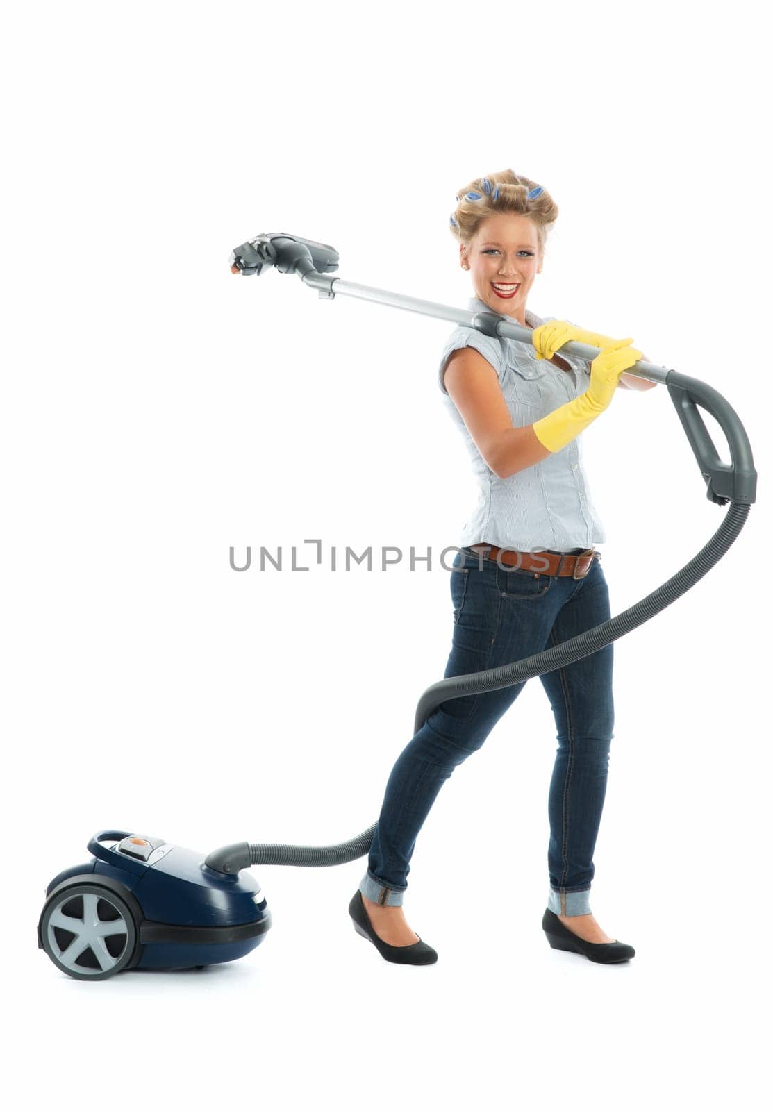 Housewife with vacuum cleaner
