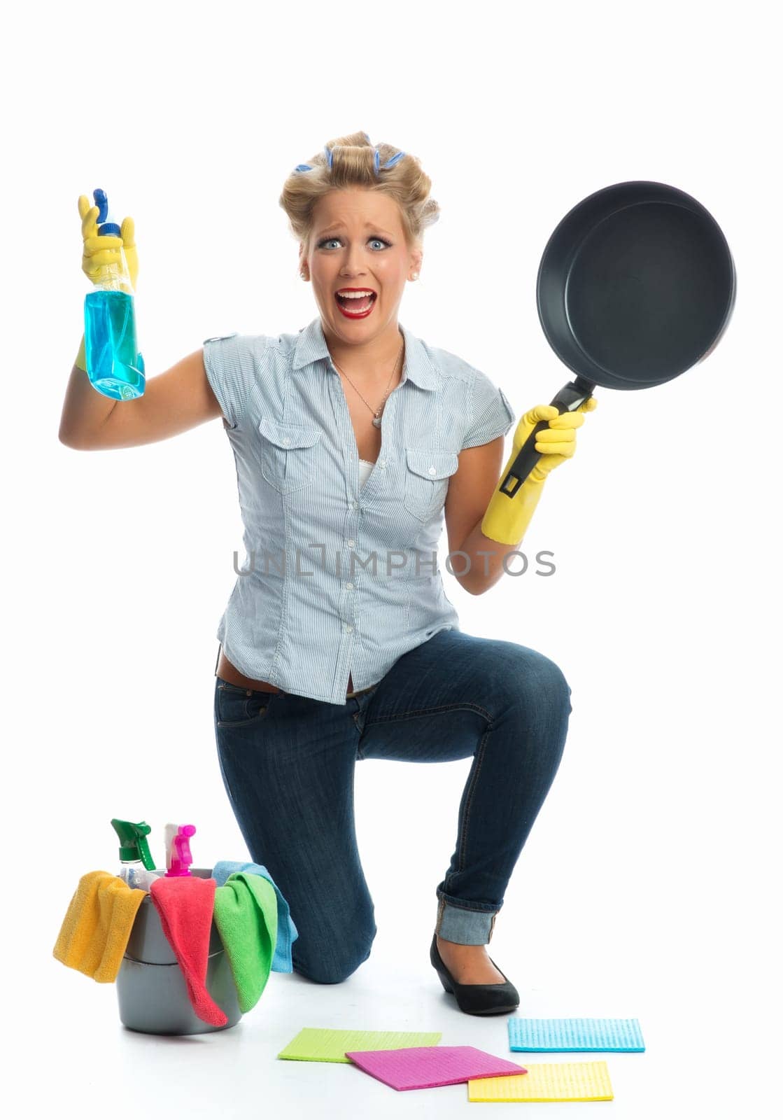 Stressed housewife cleans frying pan