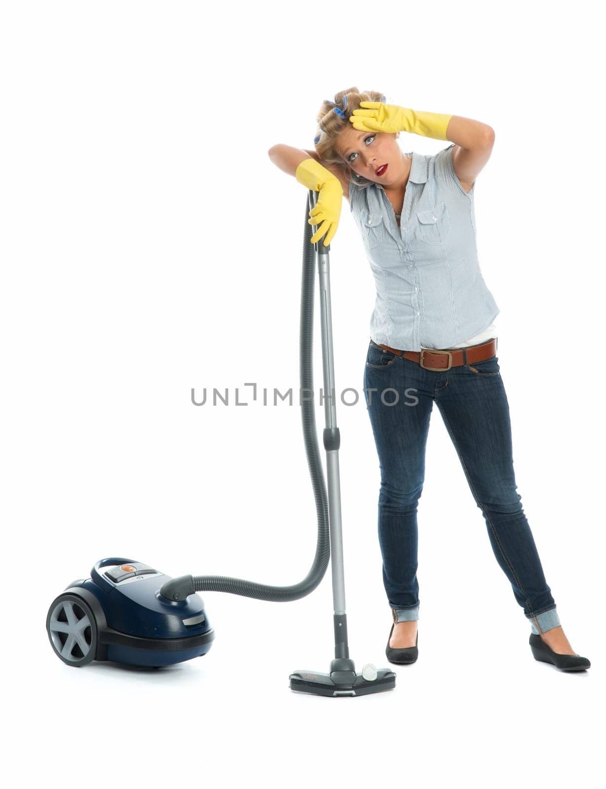 Housewife with vacuum cleaner