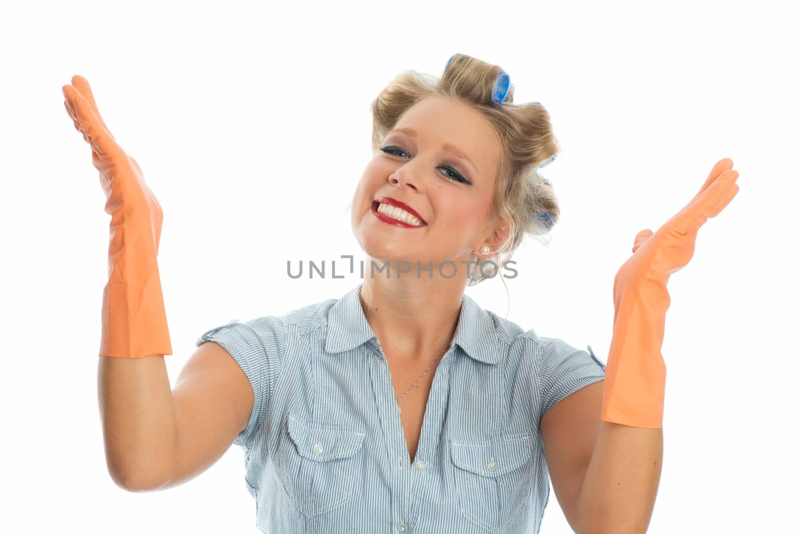 Housewife with rubber gloves