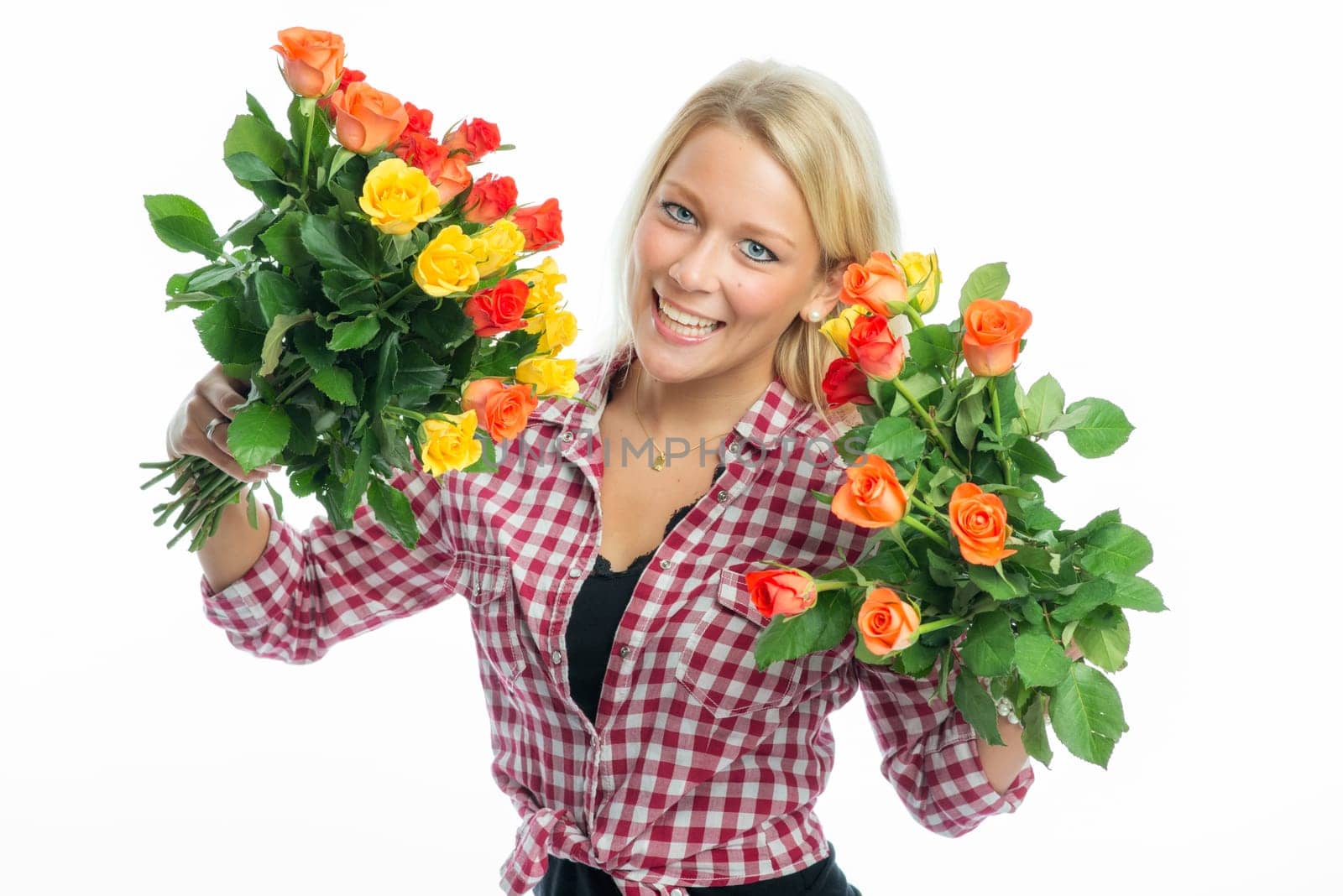 Blonde woman holds rose bouquet