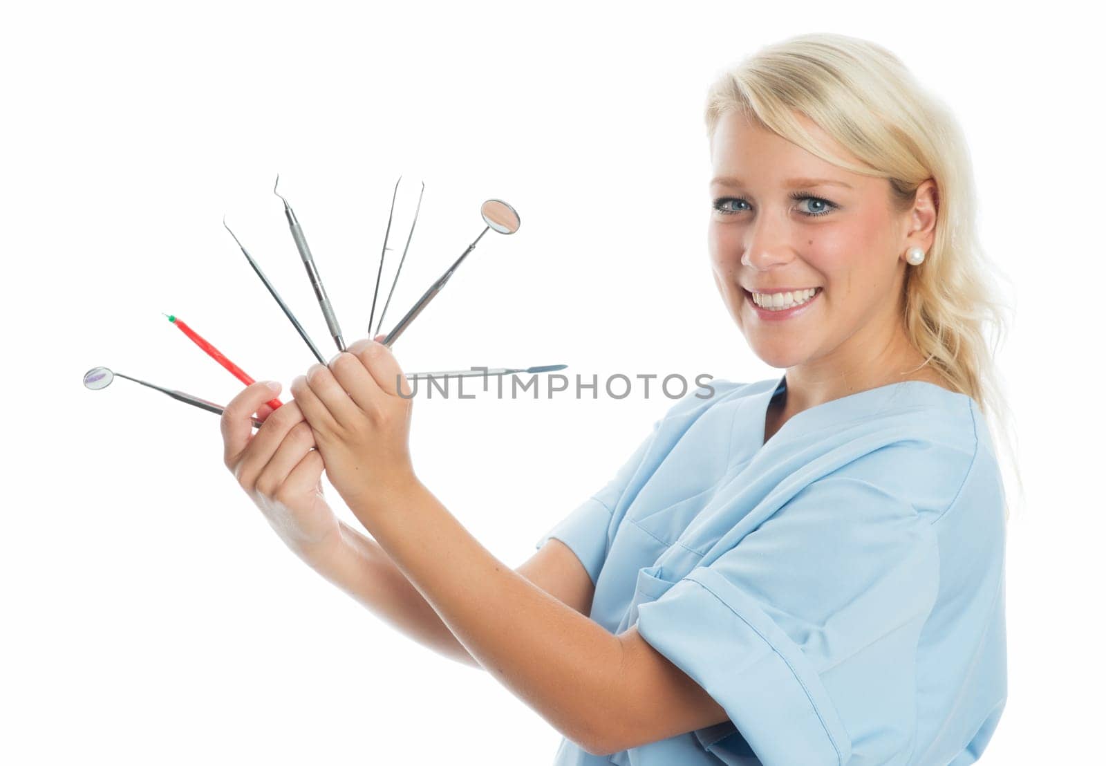 Dentist with dental cutlery