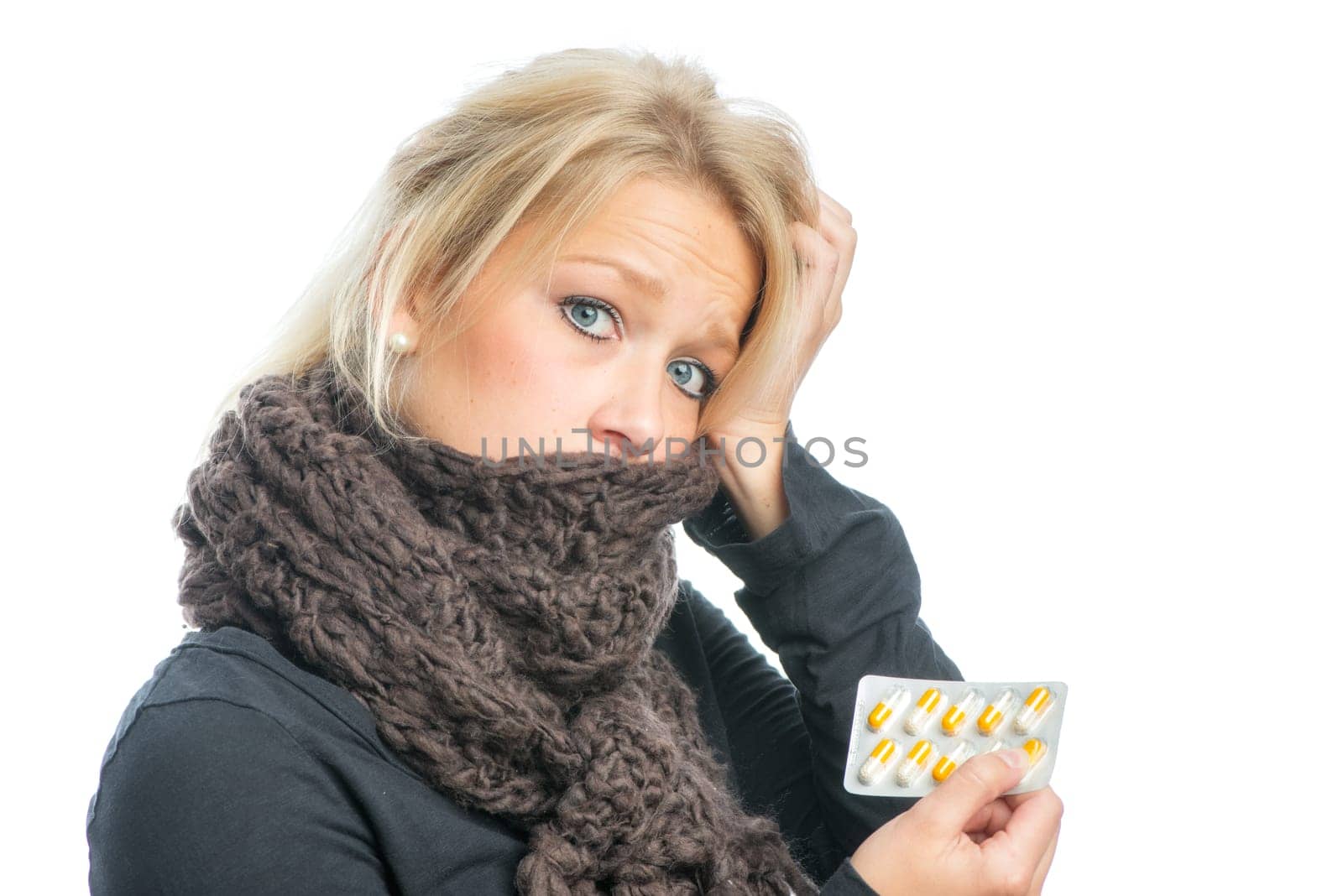 Sick blonde woman with medication
