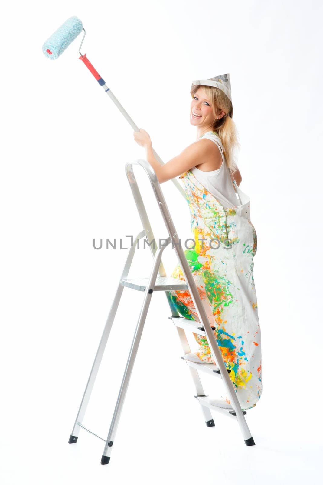Female painter on step ladder