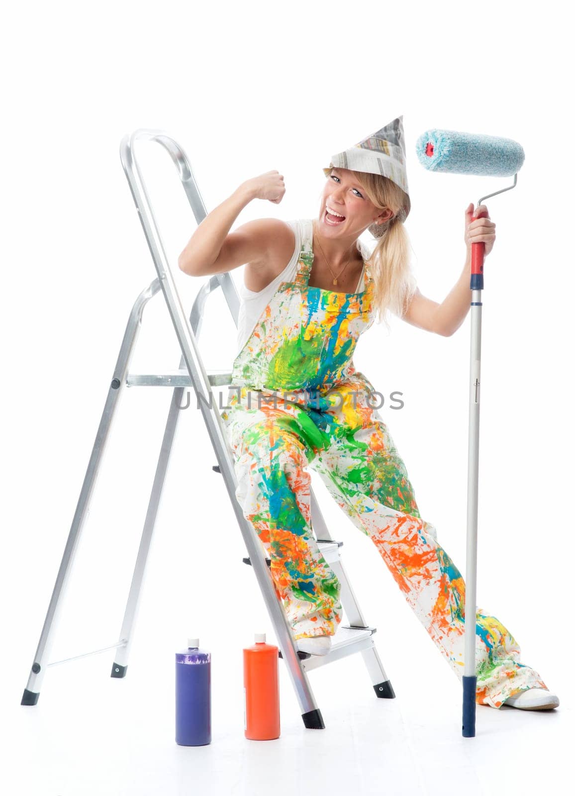 Satisfied painter on step ladder
