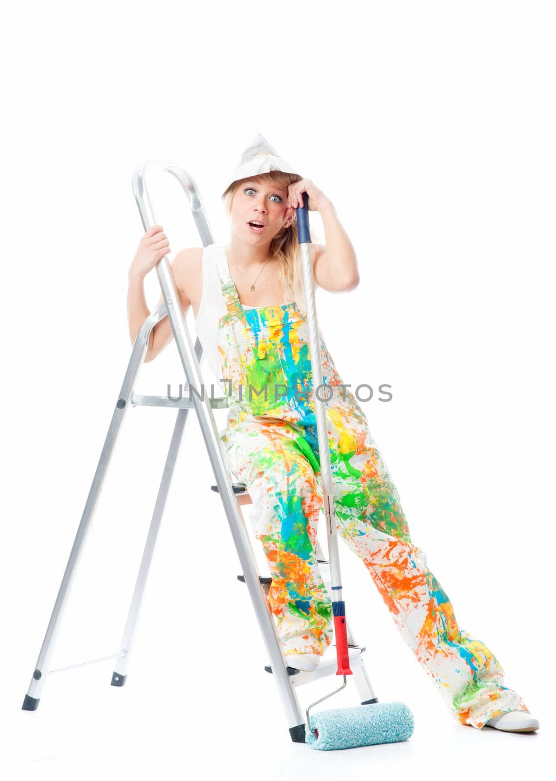 Tired painter on step ladder