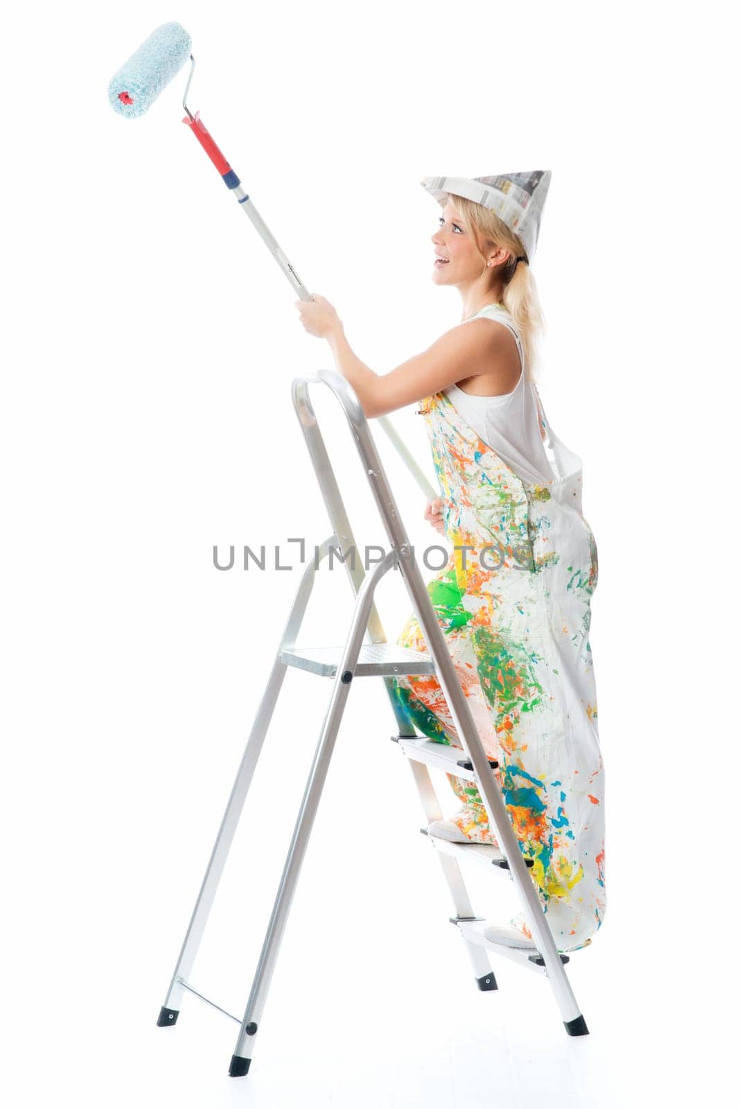 Female painter on step ladder