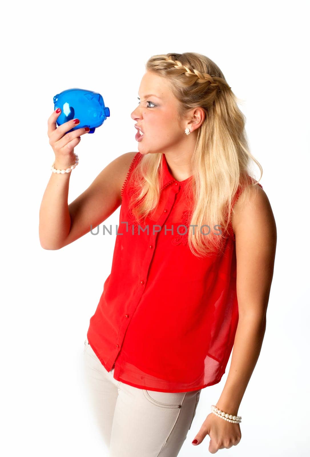 Blonde woman with piggy bank