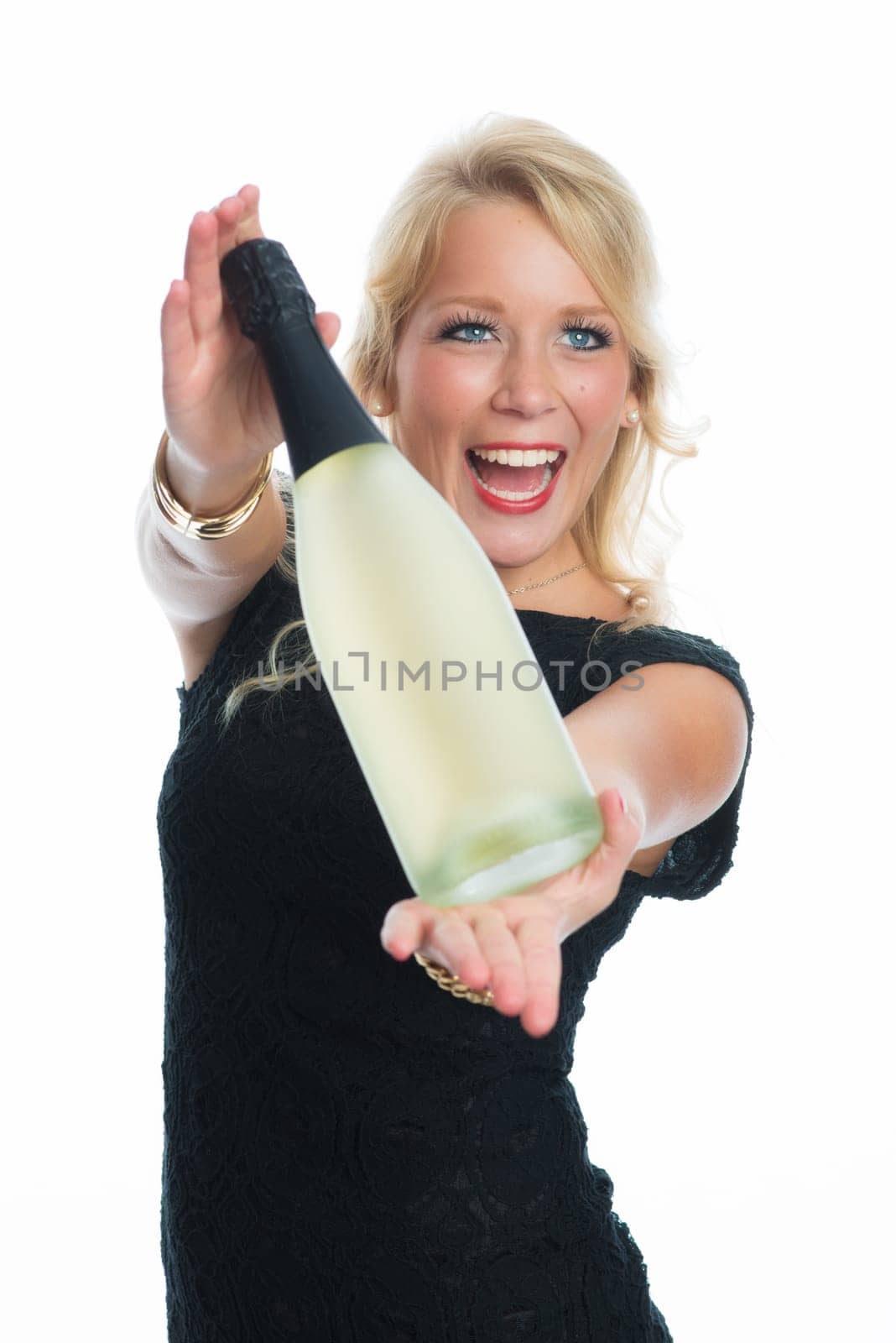 Woman holds champagne bottle