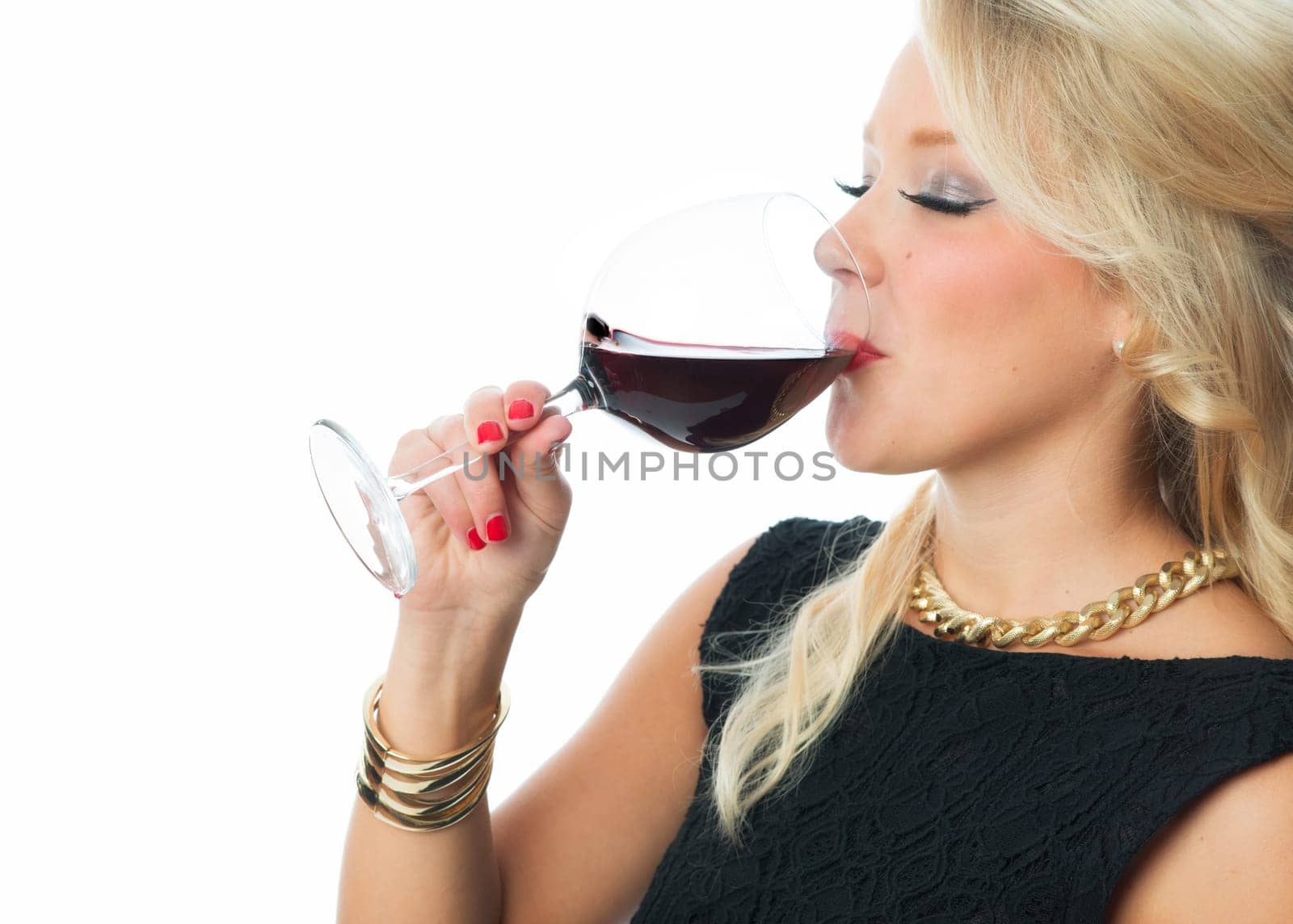 Blonde woman with glass of red wine