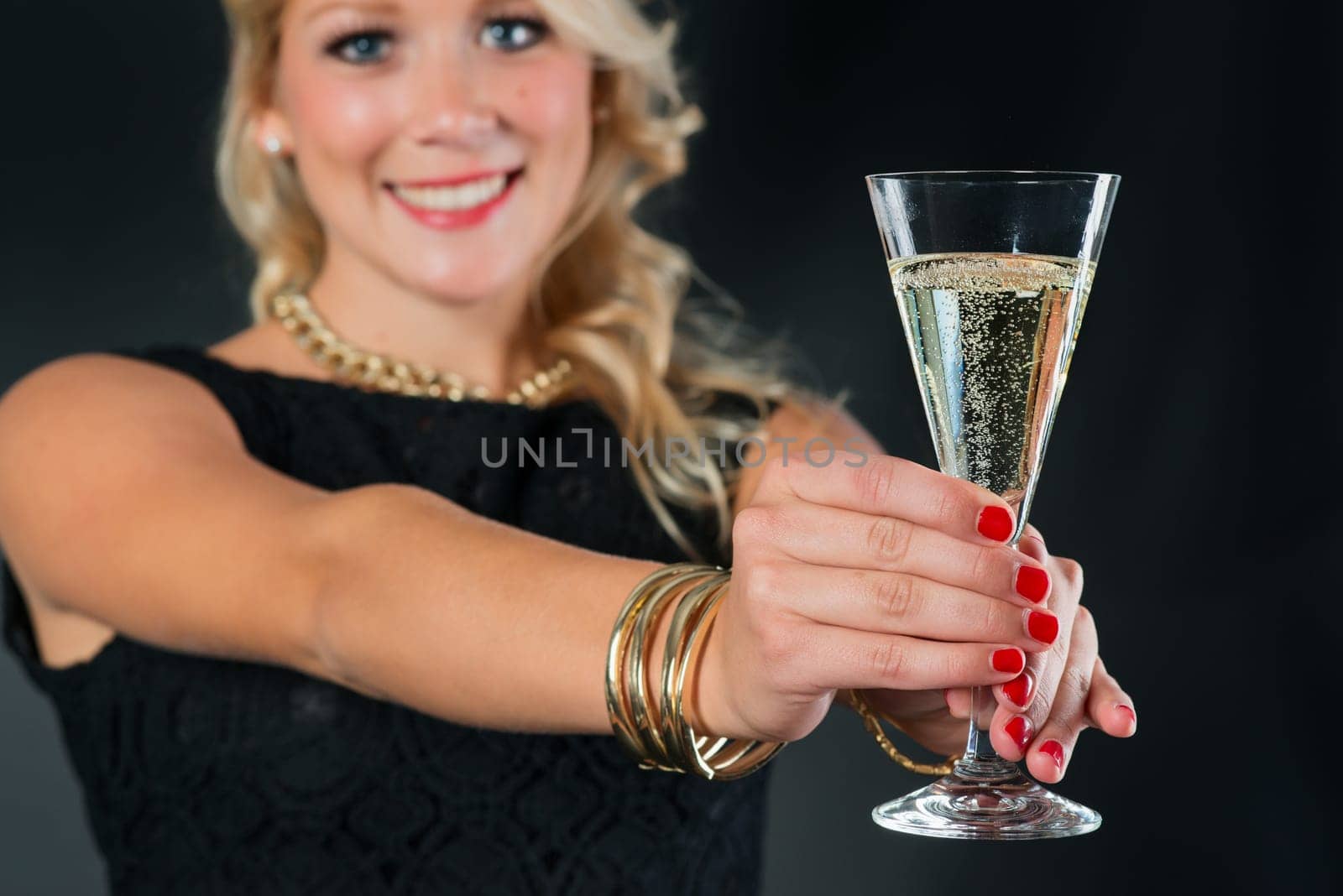 Elegant woman with sparkling wine