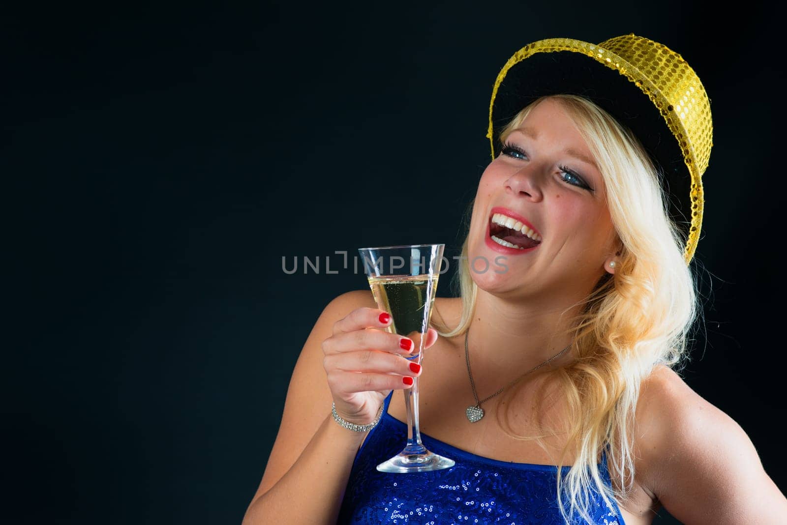 Blonde woman celebrates New Year's Eve