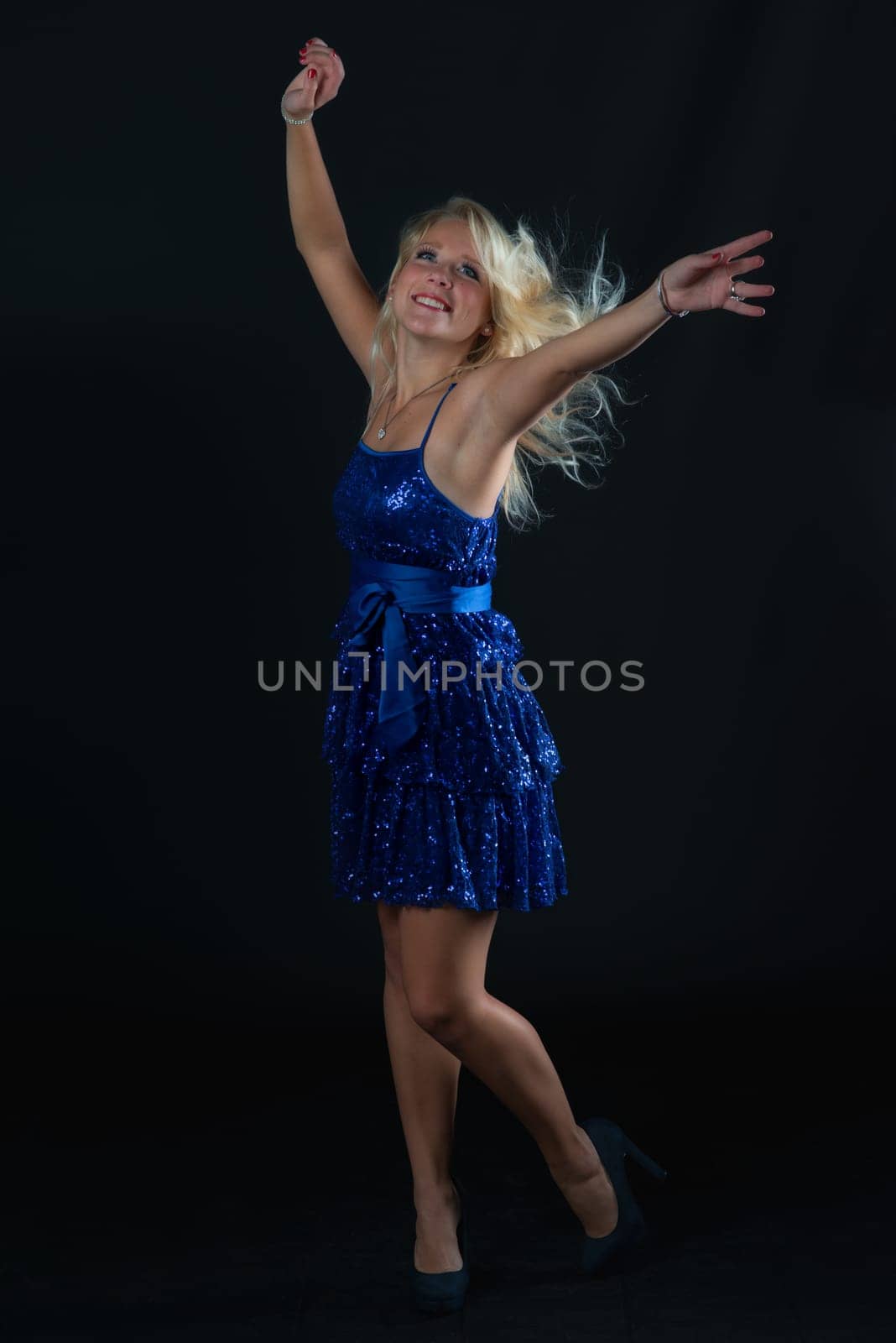 Dancing blonde woman