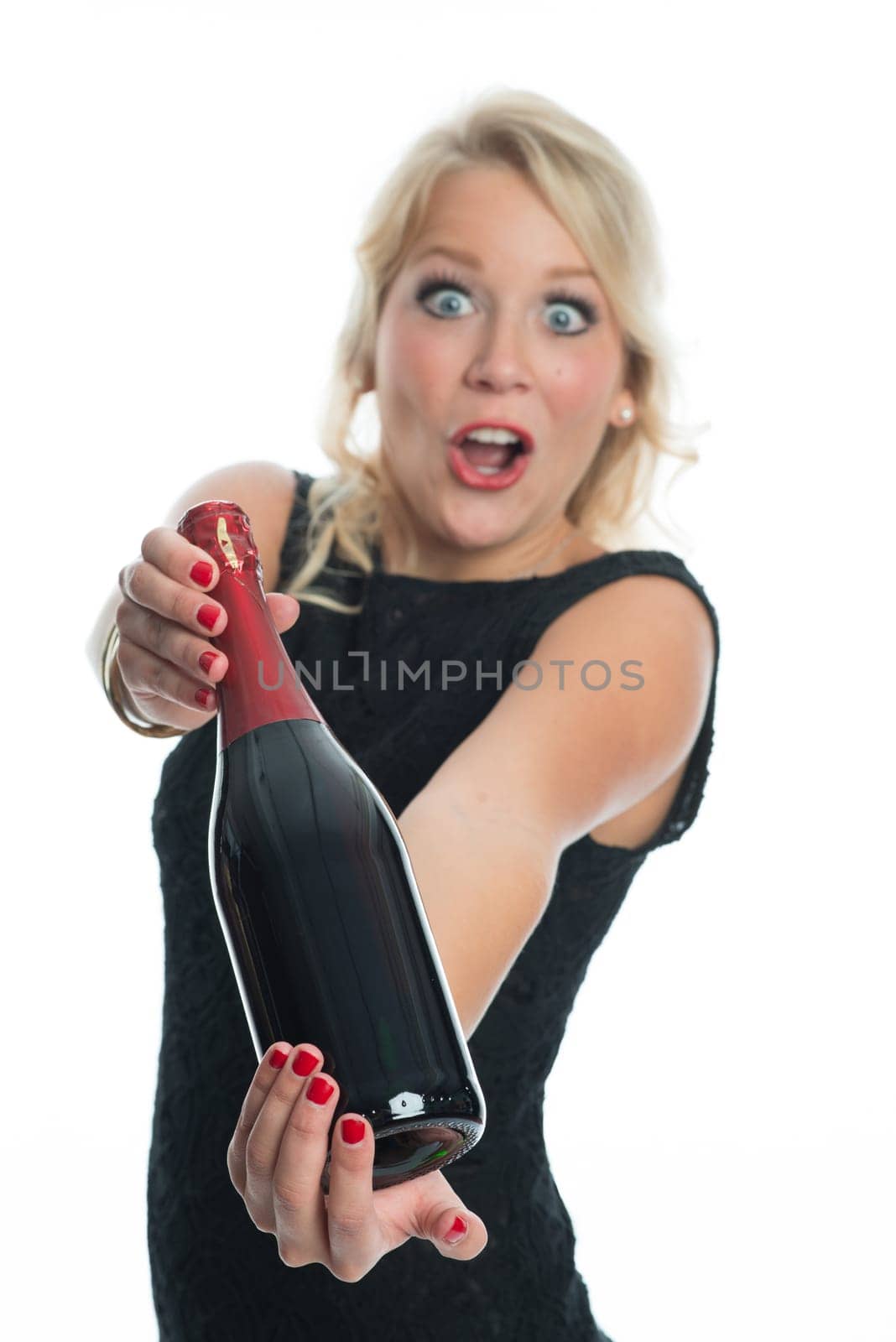 Woman with sparkling wine bottle