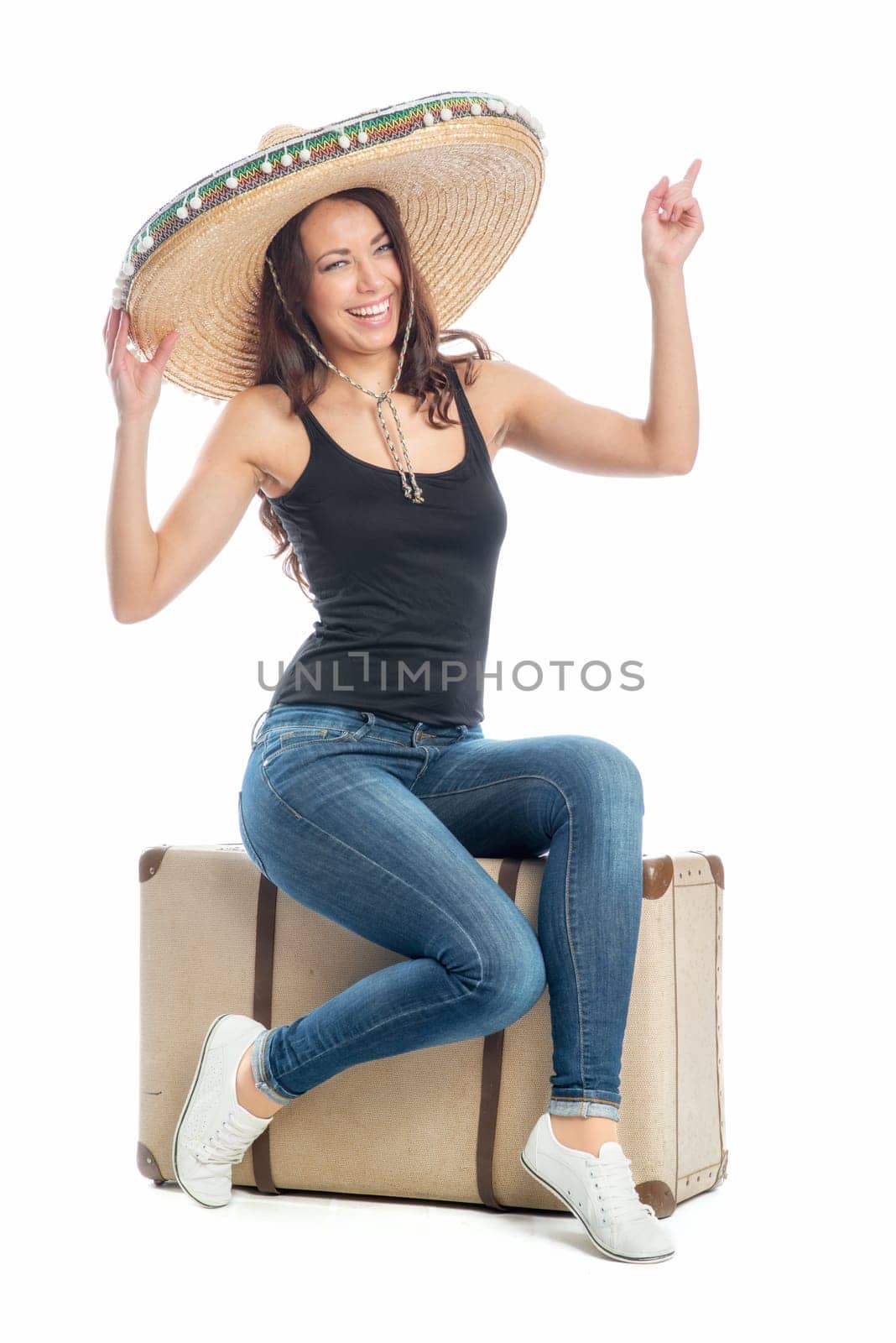 Woman with suitcase and sombrero