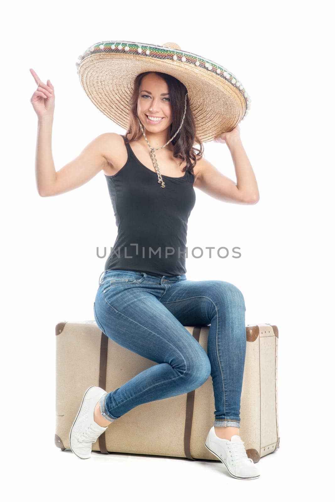 Woman with suitcase and sombrero