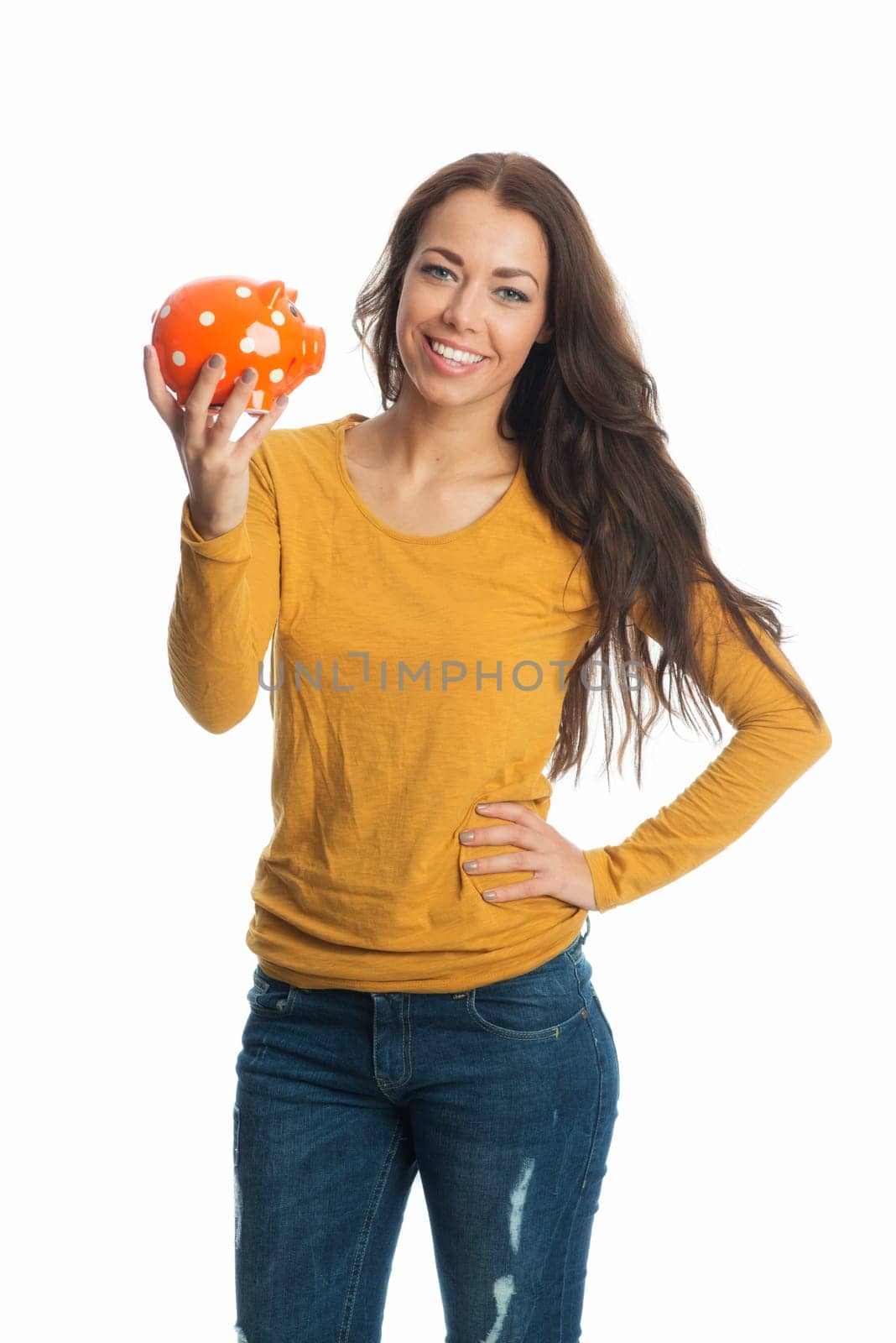 Young woman with piggy bank
